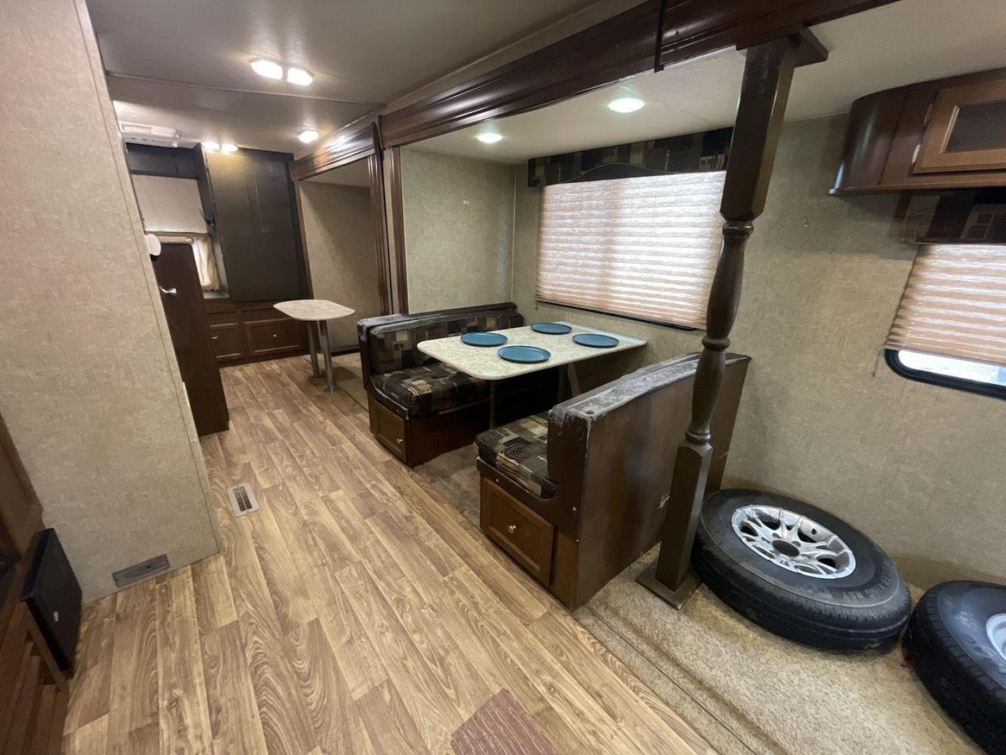 2015 WHITE KZ VENTURE RV SPORTTREK (4EZT13128F5) , Length: 35.6 ft | Dry Weight: 7,110 lbs | Gross Weight: 8,300 lbs | Slides: 2 transmission, located at 4319 N Main St, Cleburne, TX, 76033, (817) 678-5133, 32.385960, -97.391212 - With the 2015 KZ Venture RV SportTrek Travel Trailer, set out on your next adventure. With the modern traveler in mind, this travel trailer offers the ideal balance of comfort, style, and functionality. This unit measures 35.5 ft in length, 8 ft in width, and 10.92 ft in height. It has a dry weig - Photo#13