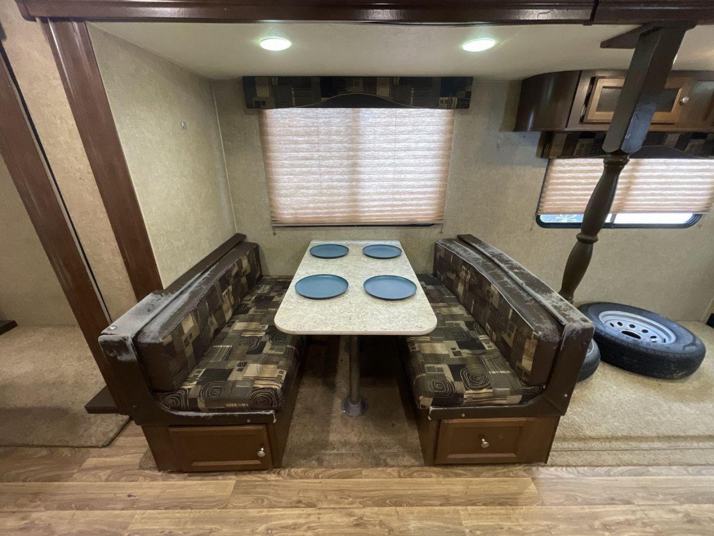 2015 WHITE KZ VENTURE RV SPORTTREK (4EZT13128F5) , Length: 35.6 ft | Dry Weight: 7,110 lbs | Gross Weight: 8,300 lbs | Slides: 2 transmission, located at 4319 N Main St, Cleburne, TX, 76033, (817) 678-5133, 32.385960, -97.391212 - With the 2015 KZ Venture RV SportTrek Travel Trailer, set out on your next adventure. With the modern traveler in mind, this travel trailer offers the ideal balance of comfort, style, and functionality. This unit measures 35.5 ft in length, 8 ft in width, and 10.92 ft in height. It has a dry weig - Photo#14