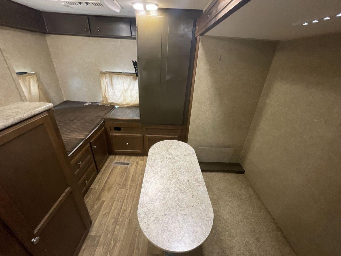 2015 WHITE KZ VENTURE RV SPORTTREK (4EZT13128F5) , Length: 35.6 ft | Dry Weight: 7,110 lbs | Gross Weight: 8,300 lbs | Slides: 2 transmission, located at 4319 N Main St, Cleburne, TX, 76033, (817) 678-5133, 32.385960, -97.391212 - With the 2015 KZ Venture RV SportTrek Travel Trailer, set out on your next adventure. With the modern traveler in mind, this travel trailer offers the ideal balance of comfort, style, and functionality. This unit measures 35.5 ft in length, 8 ft in width, and 10.92 ft in height. It has a dry weig - Photo#19