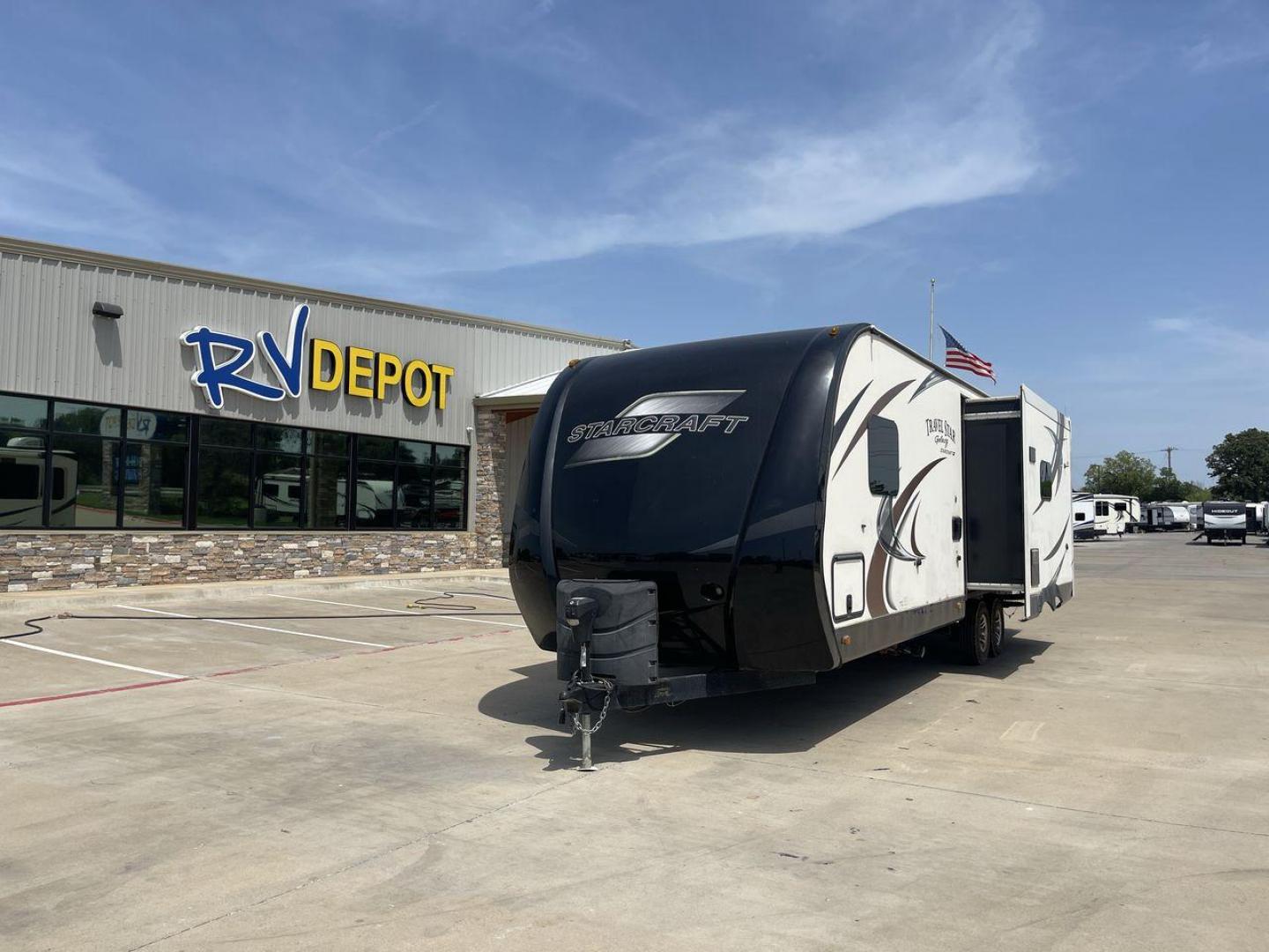 2015 TAN STARCRAFT TRAVEL STAR 294RESA (1SABS0BR5F2) , Length: 34 ft. | Dry Weight: 7,230 lbs. | Gross Weight: 9,250 lbs. | Slides: 3 transmission, located at 4319 N Main St, Cleburne, TX, 76033, (817) 678-5133, 32.385960, -97.391212 - This 2015 Travel Star 294RESA is a dual-axle steel wheel setup measuring 34 ft. in length and 11.38 ft. in height. It has a dry weight of 7,230 lbs. and a GVWR of 9,250 lbs. It also has a hitch weight of 865 lbs. This travel trailer includes three slides as well as one awning. The interior features - Photo#0