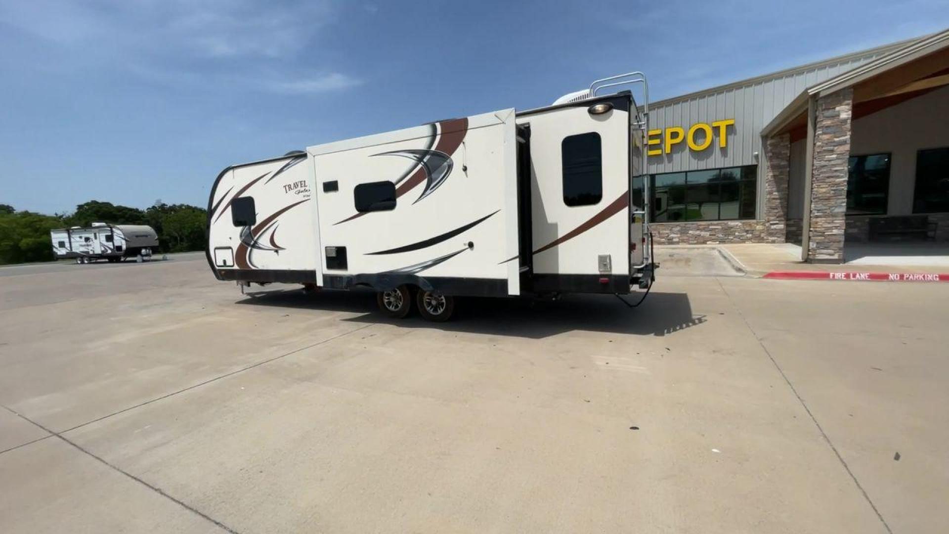 2015 TAN STARCRAFT TRAVEL STAR 294RESA (1SABS0BR5F2) , Length: 34 ft. | Dry Weight: 7,230 lbs. | Gross Weight: 9,250 lbs. | Slides: 3 transmission, located at 4319 N Main St, Cleburne, TX, 76033, (817) 678-5133, 32.385960, -97.391212 - This 2015 Travel Star 294RESA is a dual-axle steel wheel setup measuring 34 ft. in length and 11.38 ft. in height. It has a dry weight of 7,230 lbs. and a GVWR of 9,250 lbs. It also has a hitch weight of 865 lbs. This travel trailer includes three slides as well as one awning. The interior features - Photo#7