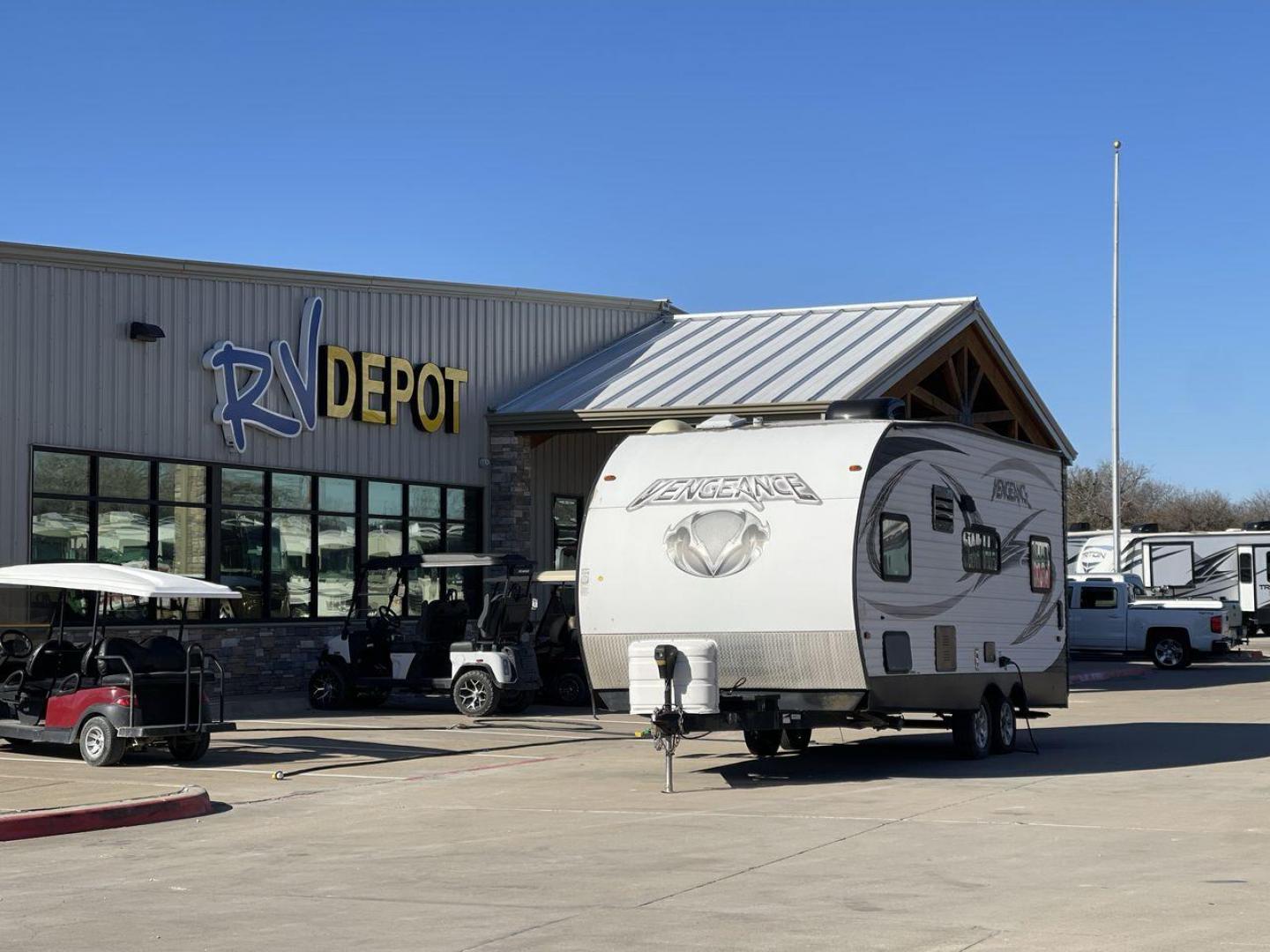 2015 WHITE VENGEANCE 19V (4X4TVGU27FY) , Length: 25 ft. | Dry Weight: 5,166 lbs. | Gross Weight: 7,945 lbs. transmission, located at 4319 N Main St, Cleburne, TX, 76033, (817) 678-5133, 32.385960, -97.391212 - The 2015 Forest River Vengeance 19V is a compact and inviting travel trailer that brings simplicity and comfort to your adventures. With a length of ~25 feet and a width of 8 feet, this trailer has a manageable size, making it easy to tow with a compatible vehicle. The sleeping capacity generously a - Photo#0