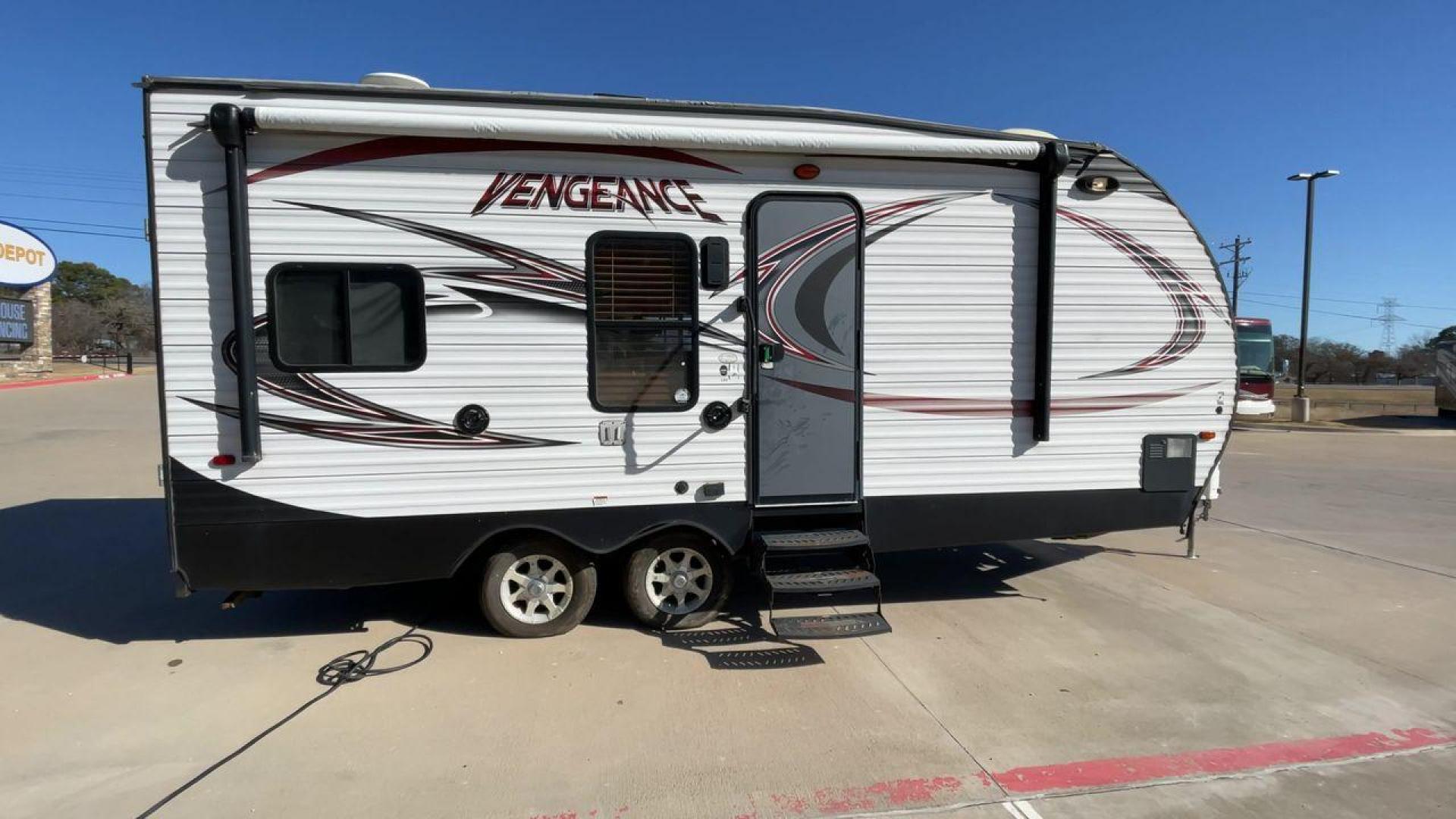 2015 WHITE VENGEANCE 19V (4X4TVGU27FY) , Length: 25 ft. | Dry Weight: 5,166 lbs. | Gross Weight: 7,945 lbs. transmission, located at 4319 N Main St, Cleburne, TX, 76033, (817) 678-5133, 32.385960, -97.391212 - The 2015 Forest River Vengeance 19V is a compact and inviting travel trailer that brings simplicity and comfort to your adventures. With a length of ~25 feet and a width of 8 feet, this trailer has a manageable size, making it easy to tow with a compatible vehicle. The sleeping capacity generously a - Photo#2