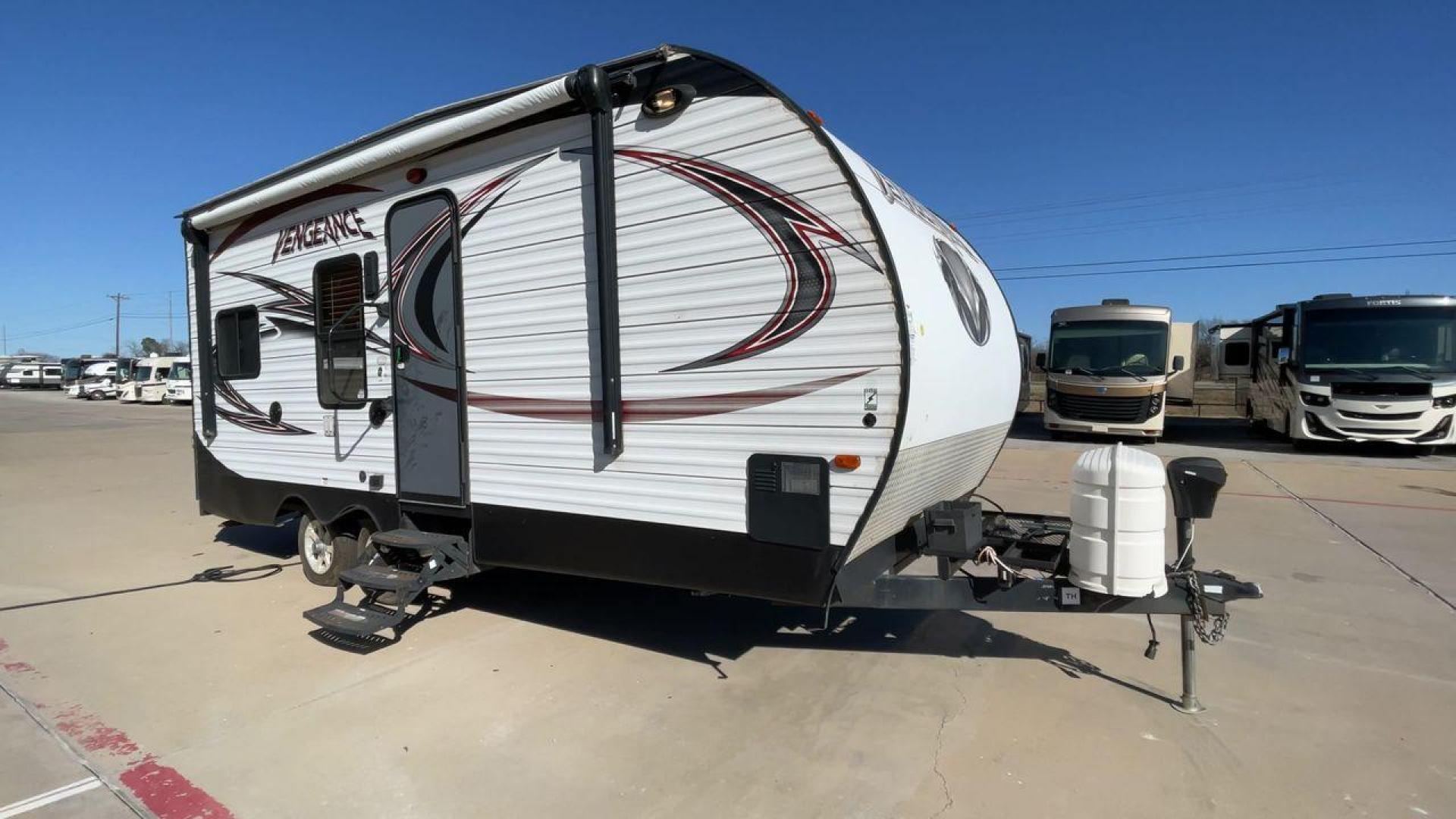 2015 WHITE VENGEANCE 19V (4X4TVGU27FY) , Length: 25 ft. | Dry Weight: 5,166 lbs. | Gross Weight: 7,945 lbs. transmission, located at 4319 N Main St, Cleburne, TX, 76033, (817) 678-5133, 32.385960, -97.391212 - The 2015 Forest River Vengeance 19V is a compact and inviting travel trailer that brings simplicity and comfort to your adventures. With a length of ~25 feet and a width of 8 feet, this trailer has a manageable size, making it easy to tow with a compatible vehicle. The sleeping capacity generously a - Photo#3