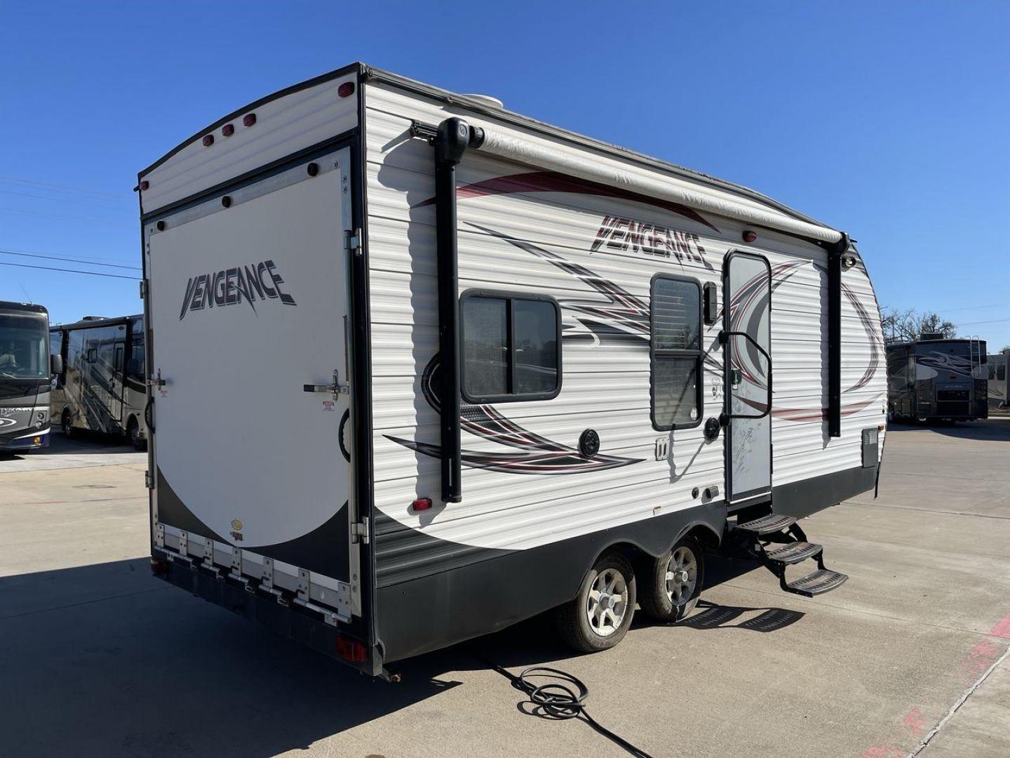 2015 WHITE VENGEANCE 19V (4X4TVGU27FY) , Length: 25 ft. | Dry Weight: 5,166 lbs. | Gross Weight: 7,945 lbs. transmission, located at 4319 N Main St, Cleburne, TX, 76033, (817) 678-5133, 32.385960, -97.391212 - The 2015 Forest River Vengeance 19V is a compact and inviting travel trailer that brings simplicity and comfort to your adventures. With a length of ~25 feet and a width of 8 feet, this trailer has a manageable size, making it easy to tow with a compatible vehicle. The sleeping capacity generously a - Photo#23