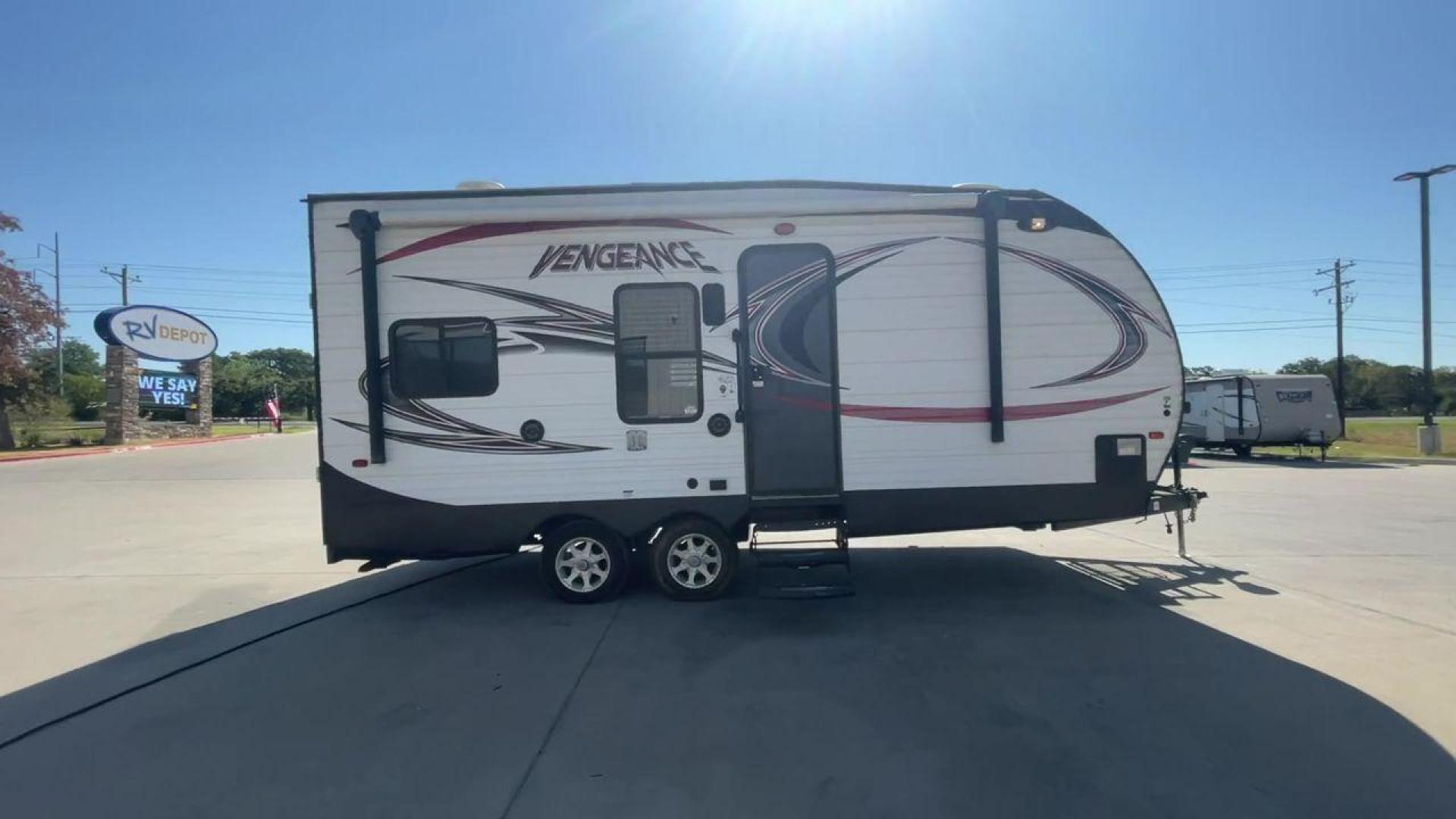 2015 WHITE VENGEANCE 19V (4X4TVGU27FY) , Length: 25 ft. | Dry Weight: 5,166 lbs. | Gross Weight: 7,945 lbs. transmission, located at 4319 N Main St, Cleburne, TX, 76033, (817) 678-5133, 32.385960, -97.391212 - The 2015 Forest River Vengeance 19V is a compact and inviting travel trailer that brings simplicity and comfort to your adventures. With a length of ~25 feet and a width of 8 feet, this trailer has a manageable size, making it easy to tow with a compatible vehicle. The sleeping capacity generously a - Photo#2