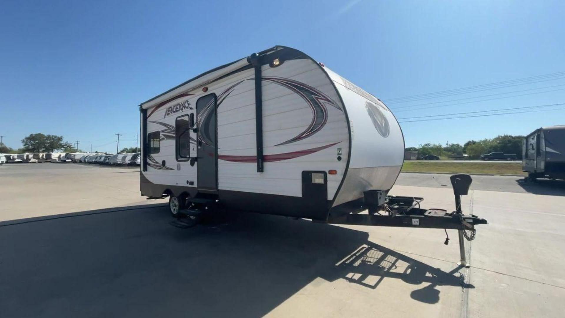 2015 WHITE VENGEANCE 19V (4X4TVGU27FY) , Length: 25 ft. | Dry Weight: 5,166 lbs. | Gross Weight: 7,945 lbs. transmission, located at 4319 N Main St, Cleburne, TX, 76033, (817) 678-5133, 32.385960, -97.391212 - The 2015 Forest River Vengeance 19V is a compact and inviting travel trailer that brings simplicity and comfort to your adventures. With a length of ~25 feet and a width of 8 feet, this trailer has a manageable size, making it easy to tow with a compatible vehicle. The sleeping capacity generously a - Photo#3