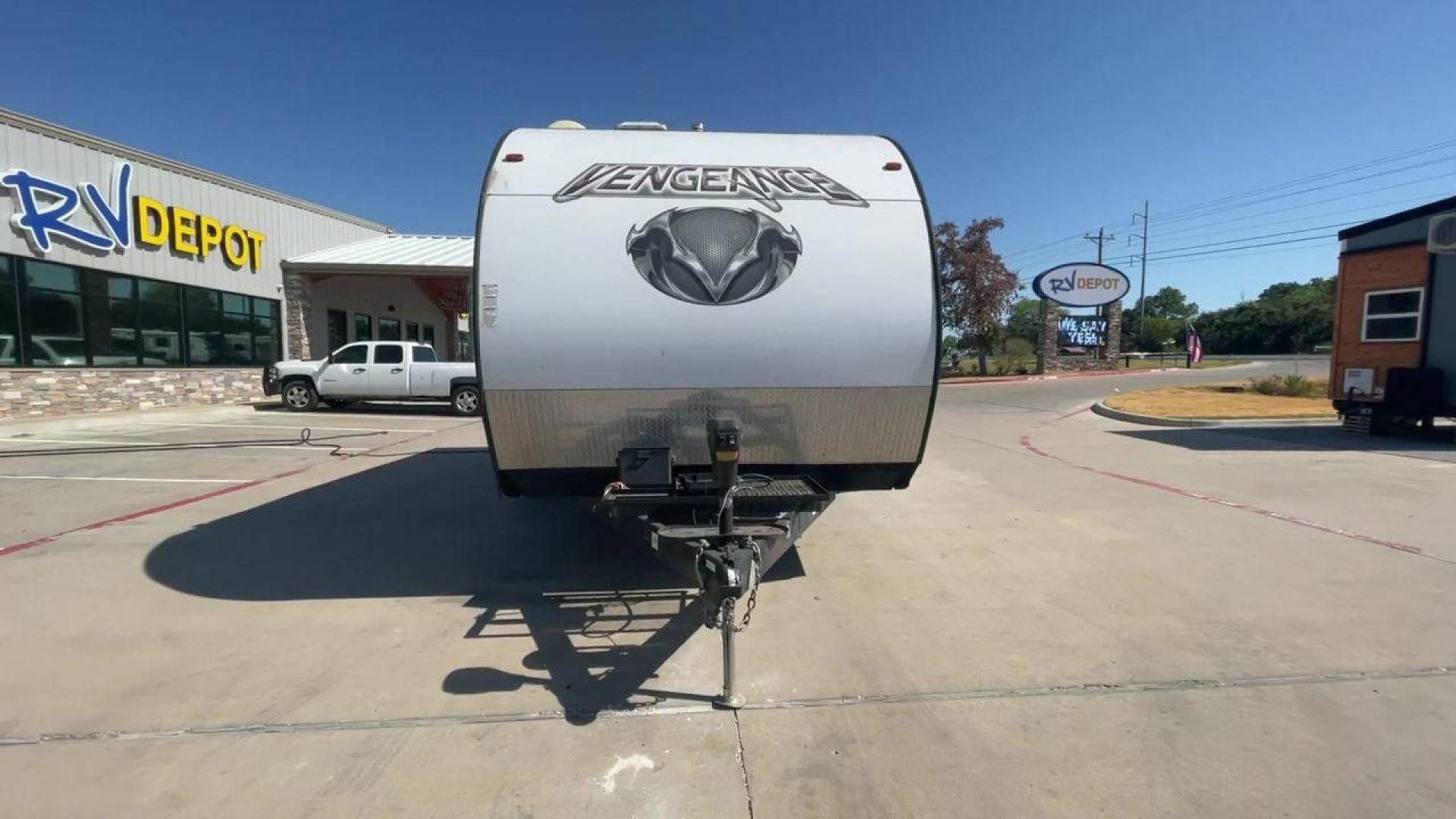 2015 WHITE VENGEANCE 19V (4X4TVGU27FY) , Length: 25 ft. | Dry Weight: 5,166 lbs. | Gross Weight: 7,945 lbs. transmission, located at 4319 N Main St, Cleburne, TX, 76033, (817) 678-5133, 32.385960, -97.391212 - The 2015 Forest River Vengeance 19V is a compact and inviting travel trailer that brings simplicity and comfort to your adventures. With a length of ~25 feet and a width of 8 feet, this trailer has a manageable size, making it easy to tow with a compatible vehicle. The sleeping capacity generously a - Photo#4