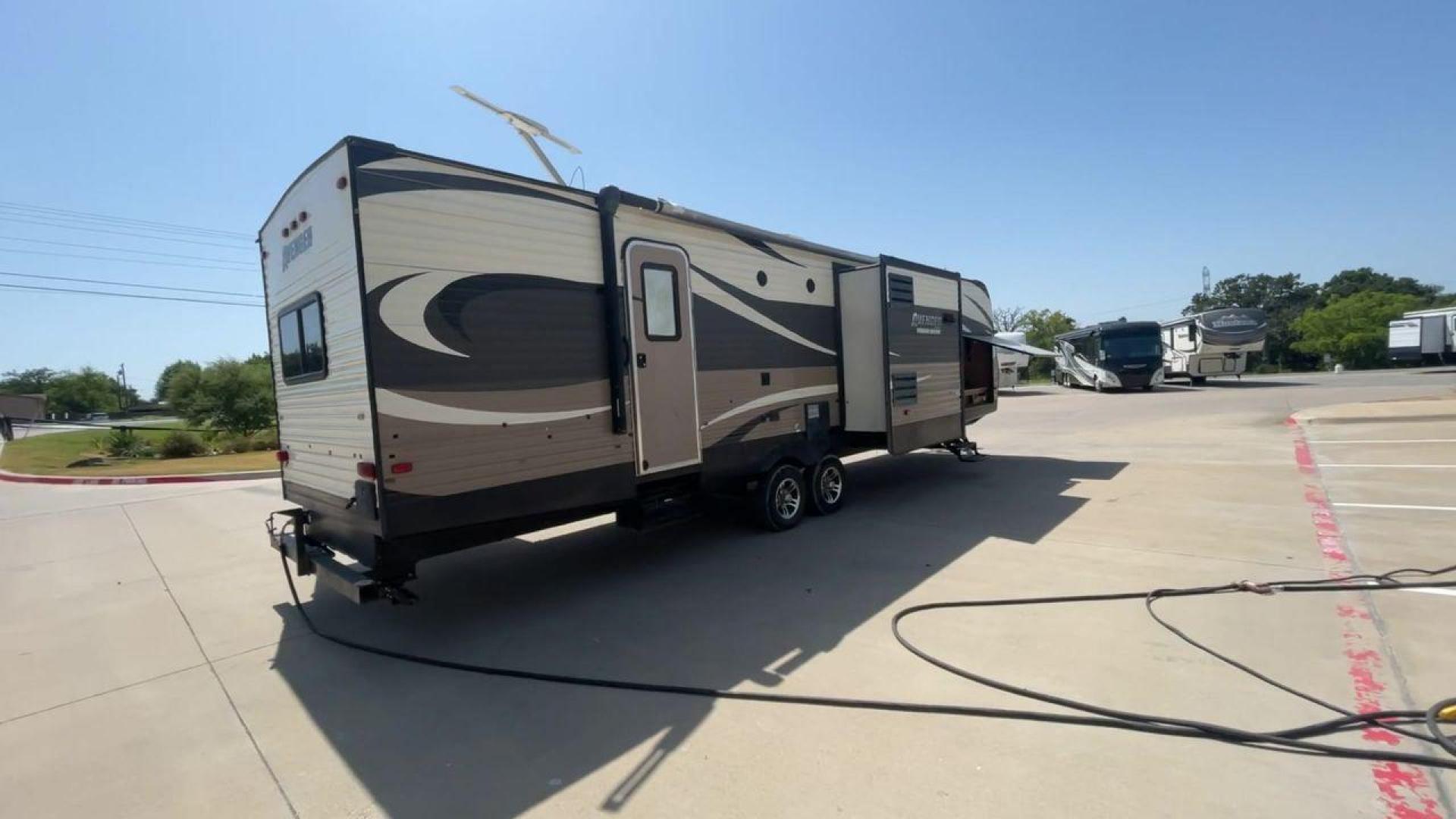 2016 TAN AVENGER 32FBI - (5ZT2AVXB6GB) , located at 4319 N Main St, Cleburne, TX, 76033, (817) 678-5133, 32.385960, -97.391212 - Photo#1