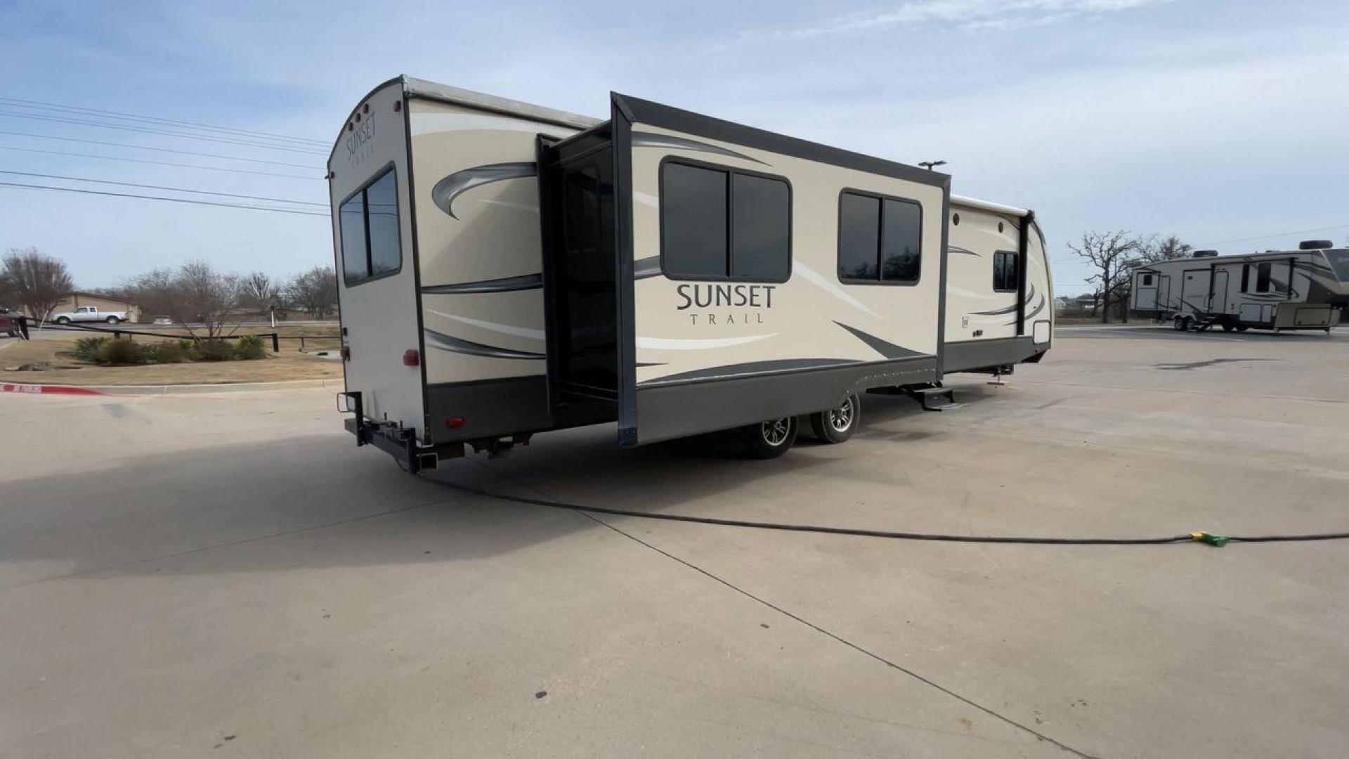 2016 BLACK CROSSROAD SUNSET TRAIL 32RE (4V0TC3226GE) , Length: 36.67 ft. | Dry Weight: 7,749 lbs. | Gross Weight: 9,728 lbs. | Slides: 3 transmission, located at 4319 N Main St, Cleburne, TX, 76033, (817) 678-5133, 32.385960, -97.391212 - This 2016 Crossroad Sunset Trail 32RE measures in at 36.67 ft. It has a dry weight of 7,749 lbs. and a GVWR of 9,728 lbs. With 3 slides, this travel trailer is extremely spacious and comfortable! Inside, you will find a homey combined living and kitchen area with an entertainment center and booth-st - Photo#1