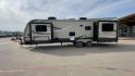 2016 BLACK CROSSROAD SUNSET TRAIL 32RE (4V0TC3226GE) , Length: 36.67 ft. | Dry Weight: 7,749 lbs. | Gross Weight: 9,728 lbs. | Slides: 3 transmission, located at 4319 N Main St, Cleburne, TX, 76033, (817) 678-5133, 32.385960, -97.391212 - This 2016 Crossroad Sunset Trail 32RE measures in at 36.67 ft. It has a dry weight of 7,749 lbs. and a GVWR of 9,728 lbs. With 3 slides, this travel trailer is extremely spacious and comfortable! Inside, you will find a homey combined living and kitchen area with an entertainment center and booth-st - Photo#6