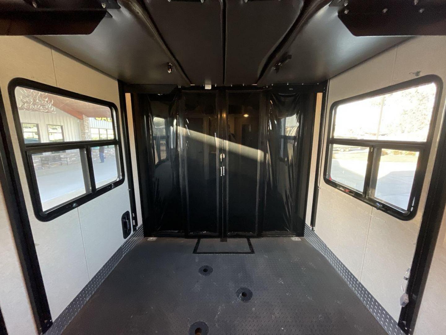 2016 CRUISER RV BOSS 4290 (5RXFJ4530G1) , Length: 46 ft. | Dry Weight: 14,835 lbs. | Slides: 2 transmission, located at 4319 N Main St, Cleburne, TX, 76033, (817) 678-5133, 32.385960, -97.391212 - The 2016 Cruiser RV Boss 4290 Recreational is a remarkable toy hauler designed for a premium travel experience. With a length of 46 feet, this model offers two slide-outs, providing an expansive and well-designed interior. It features a luxurious master bedroom with a king-size bed, and the spaciou - Photo#23