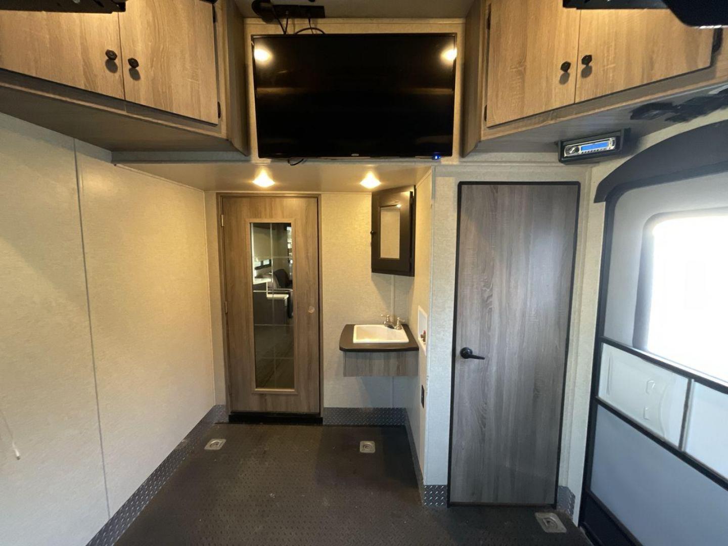 2016 CRUISER RV BOSS 4290 (5RXFJ4530G1) , Length: 46 ft. | Dry Weight: 14,835 lbs. | Slides: 2 transmission, located at 4319 N Main St, Cleburne, TX, 76033, (817) 678-5133, 32.385960, -97.391212 - The 2016 Cruiser RV Boss 4290 Recreational is a remarkable toy hauler designed for a premium travel experience. With a length of 46 feet, this model offers two slide-outs, providing an expansive and well-designed interior. It features a luxurious master bedroom with a king-size bed, and the spaciou - Photo#24