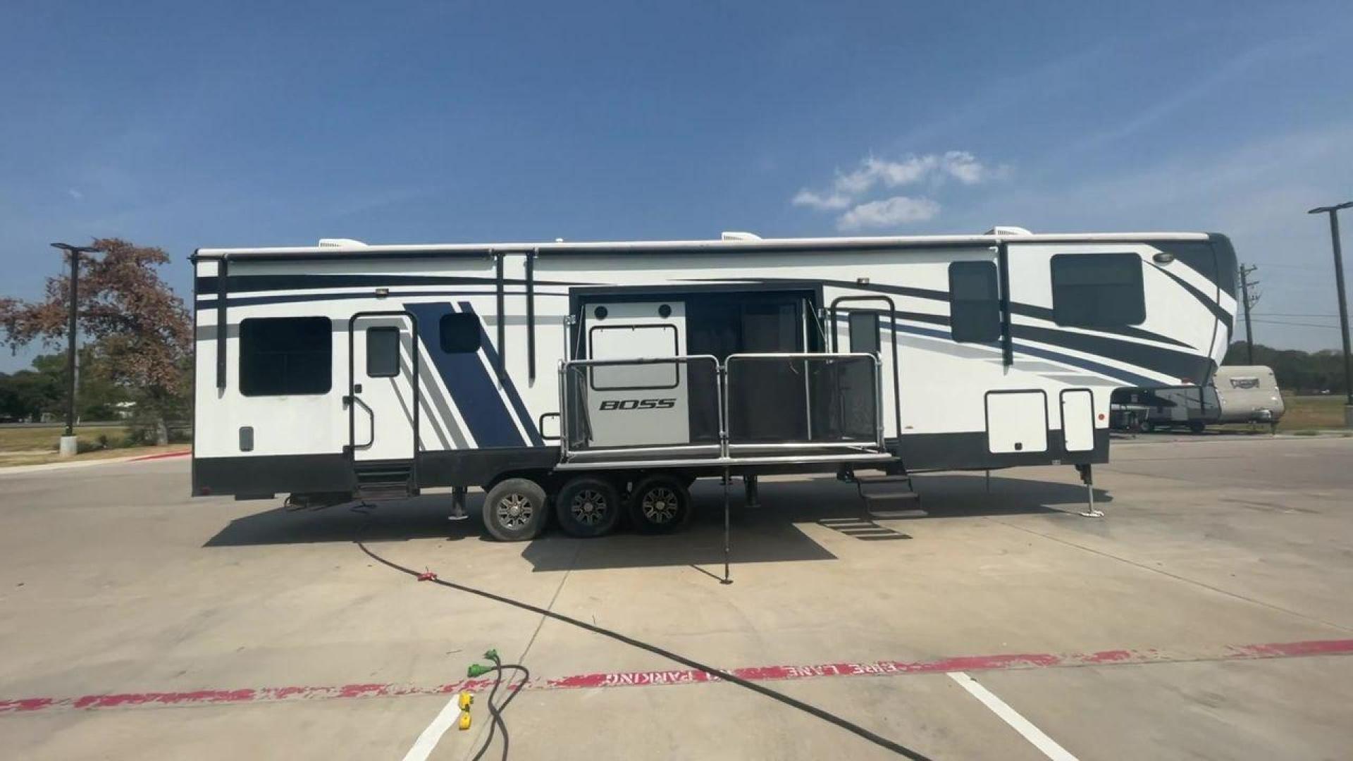 2016 CRUISER RV BOSS 4290 (5RXFJ4530G1) , Length: 46 ft. | Dry Weight: 14,835 lbs. | Slides: 2 transmission, located at 4319 N Main St, Cleburne, TX, 76033, (817) 678-5133, 32.385960, -97.391212 - The 2016 Cruiser RV Boss 4290 Recreational is a remarkable toy hauler designed for a premium travel experience. With a length of 46 feet, this model offers two slide-outs, providing an expansive and well-designed interior. It features a luxurious master bedroom with a king-size bed, and the spaciou - Photo#2