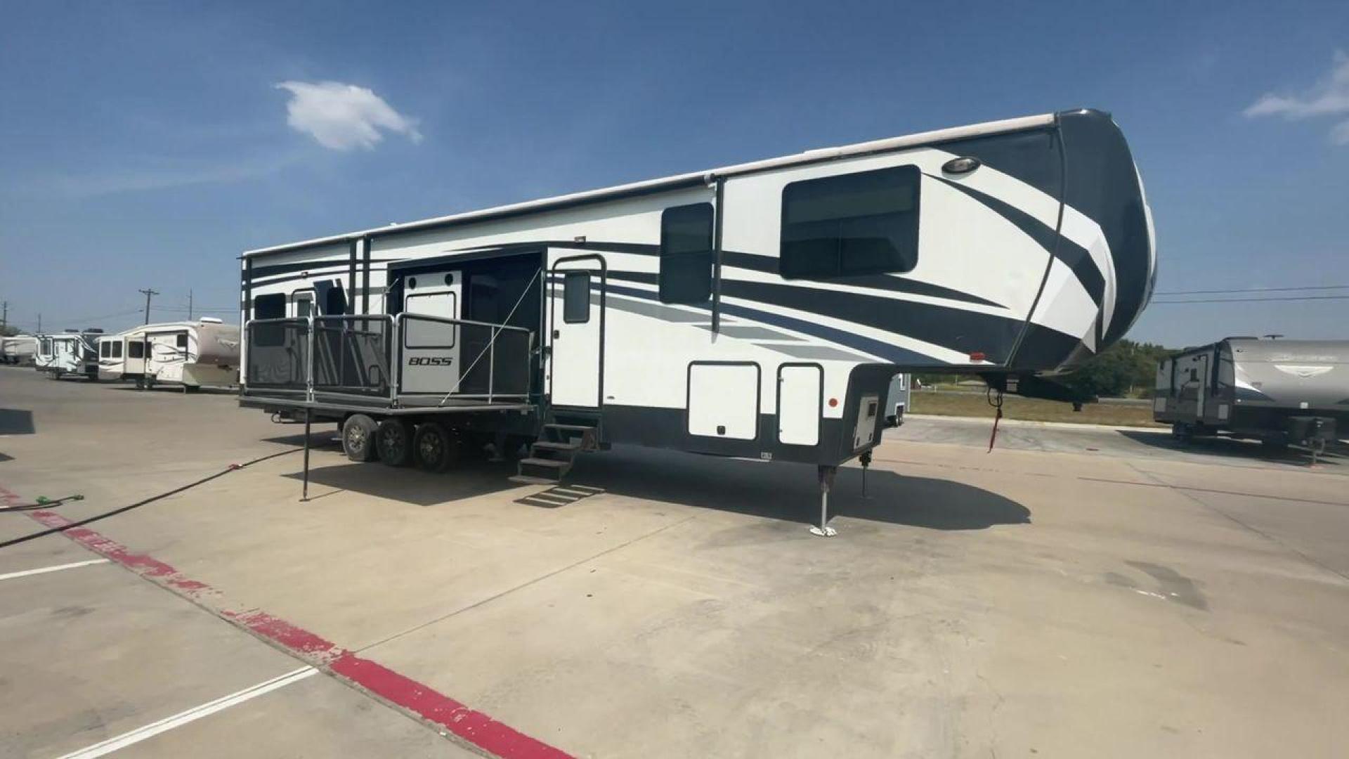 2016 CRUISER RV BOSS 4290 (5RXFJ4530G1) , Length: 46 ft. | Dry Weight: 14,835 lbs. | Slides: 2 transmission, located at 4319 N Main St, Cleburne, TX, 76033, (817) 678-5133, 32.385960, -97.391212 - The 2016 Cruiser RV Boss 4290 Recreational is a remarkable toy hauler designed for a premium travel experience. With a length of 46 feet, this model offers two slide-outs, providing an expansive and well-designed interior. It features a luxurious master bedroom with a king-size bed, and the spaciou - Photo#3