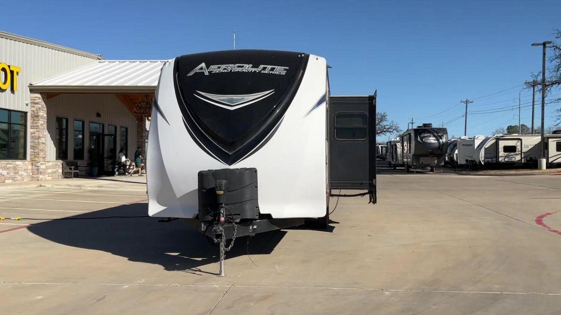 2016 DUTCHMEN AEROLITE 221BHSL (4YDT22121GP) , Length: 26.58 ft. | Dry Weight: 5,271 lbs. | Slides: 1 transmission, located at 4319 N Main St, Cleburne, TX, 76033, (817) 678-5133, 32.385960, -97.391212 - Experience the 2016 Dutchmen Aerolite 221BHSL Travel Trailer, which offers the ideal balance of comfort and adaptability. This travel trailer provides a comfortable living area for your road trips and is ideal for both families and adventure seekers. This trailer measures 26.58 ft in length by 11.42 - Photo#4