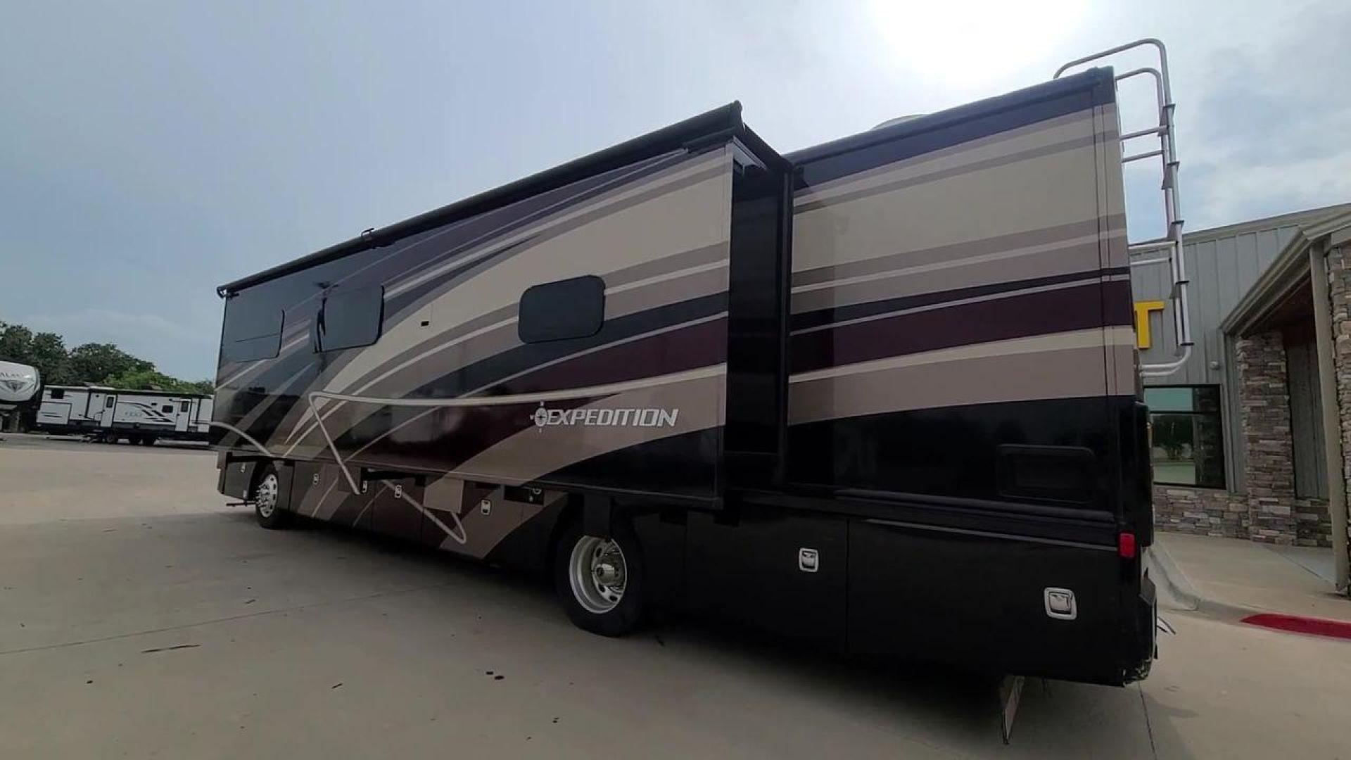 2016 BLACK DES FLEETWOOD EXPEDITION 38K (4UZACWDT2GC) , Length: 38.62 ft | Gross Weight: 32,400 lbs. | Slides: 3 transmission, located at 4319 N Main St, Cleburne, TX, 76033, (817) 678-5133, 32.385960, -97.391212 - The 2016 Fleetwood Expedition 36K motorhome runs for about 50,505 miles. The dimensions are 38.62 ft in length, 8.5 ft in width, 12.83 ft in height, 7 ft interior height, and a wheelbase of 21 ft. It has a towing capacity of 10,000 lbs and a GVWR of 32,400 lbs. There are three total slideouts and on - Photo#1