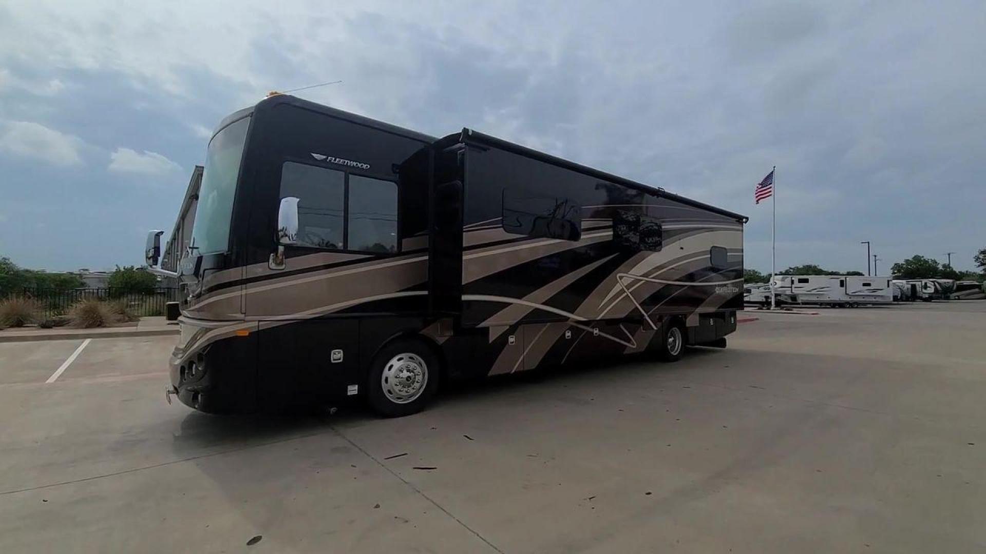 2016 BLACK DES FLEETWOOD EXPEDITION 38K (4UZACWDT2GC) , Length: 38.62 ft | Gross Weight: 32,400 lbs. | Slides: 3 transmission, located at 4319 N Main St, Cleburne, TX, 76033, (817) 678-5133, 32.385960, -97.391212 - The 2016 Fleetwood Expedition 36K motorhome runs for about 50,505 miles. The dimensions are 38.62 ft in length, 8.5 ft in width, 12.83 ft in height, 7 ft interior height, and a wheelbase of 21 ft. It has a towing capacity of 10,000 lbs and a GVWR of 32,400 lbs. There are three total slideouts and on - Photo#3