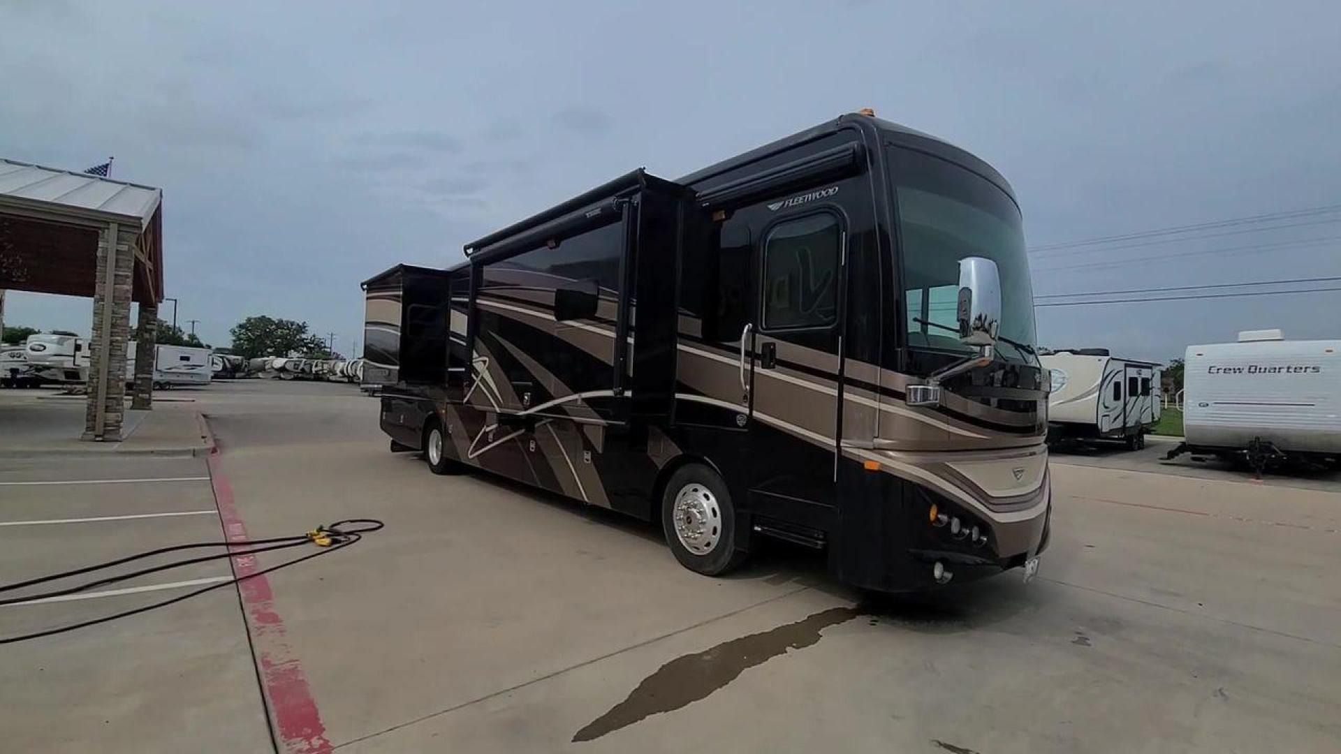 2016 BLACK DES FLEETWOOD EXPEDITION 38K (4UZACWDT2GC) , Length: 38.62 ft | Gross Weight: 32,400 lbs. | Slides: 3 transmission, located at 4319 N Main St, Cleburne, TX, 76033, (817) 678-5133, 32.385960, -97.391212 - The 2016 Fleetwood Expedition 36K motorhome runs for about 50,505 miles. The dimensions are 38.62 ft in length, 8.5 ft in width, 12.83 ft in height, 7 ft interior height, and a wheelbase of 21 ft. It has a towing capacity of 10,000 lbs and a GVWR of 32,400 lbs. There are three total slideouts and on - Photo#5