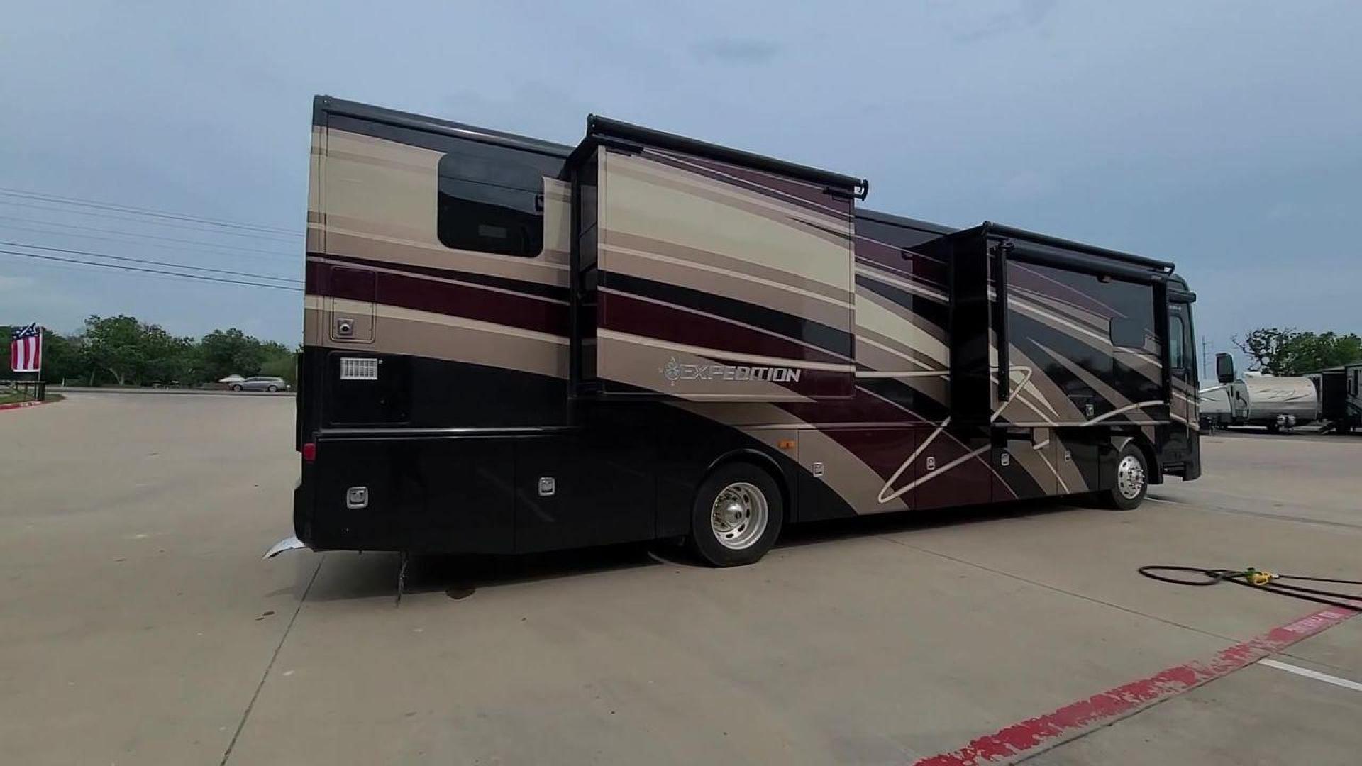 2016 BLACK DES FLEETWOOD EXPEDITION 38K (4UZACWDT2GC) , Length: 38.62 ft | Gross Weight: 32,400 lbs. | Slides: 3 transmission, located at 4319 N Main St, Cleburne, TX, 76033, (817) 678-5133, 32.385960, -97.391212 - The 2016 Fleetwood Expedition 36K motorhome runs for about 50,505 miles. The dimensions are 38.62 ft in length, 8.5 ft in width, 12.83 ft in height, 7 ft interior height, and a wheelbase of 21 ft. It has a towing capacity of 10,000 lbs and a GVWR of 32,400 lbs. There are three total slideouts and on - Photo#7