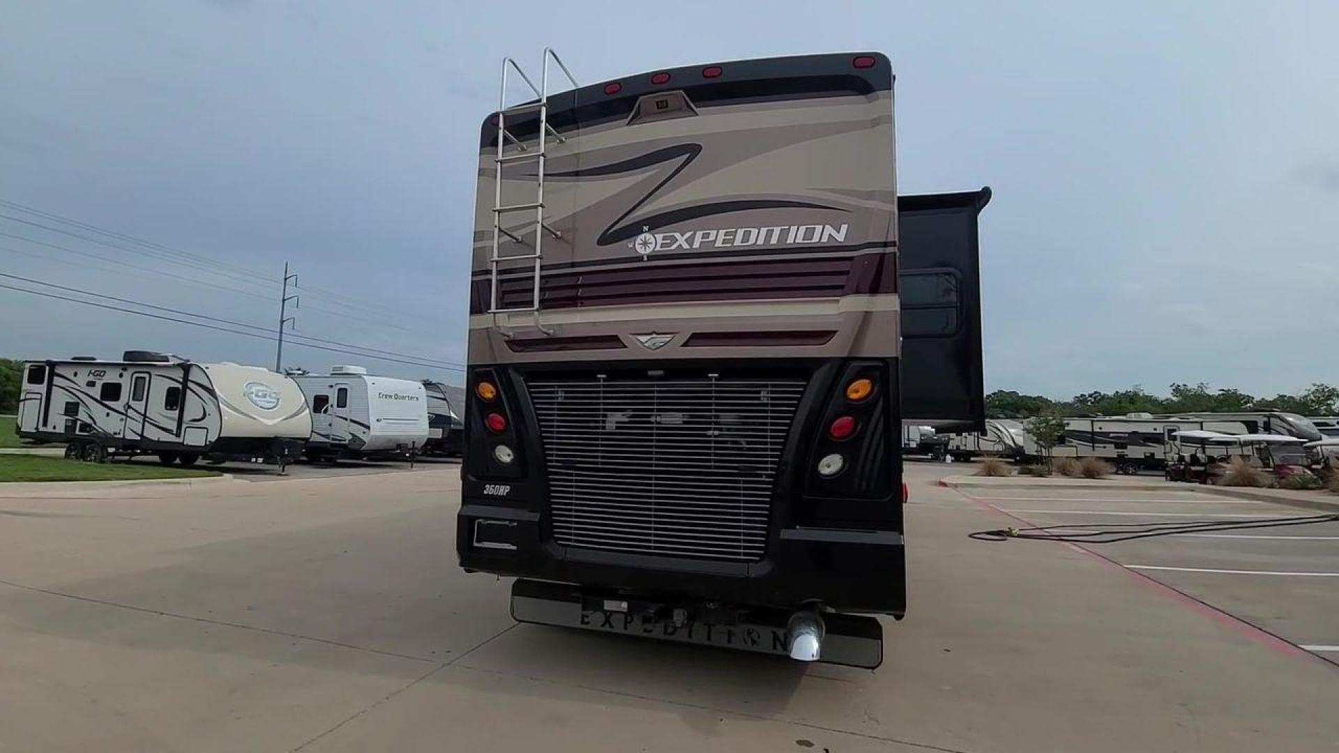 2016 BLACK DES FLEETWOOD EXPEDITION 38K (4UZACWDT2GC) , Length: 38.62 ft | Gross Weight: 32,400 lbs. | Slides: 3 transmission, located at 4319 N Main St, Cleburne, TX, 76033, (817) 678-5133, 32.385960, -97.391212 - The 2016 Fleetwood Expedition 36K motorhome runs for about 50,505 miles. The dimensions are 38.62 ft in length, 8.5 ft in width, 12.83 ft in height, 7 ft interior height, and a wheelbase of 21 ft. It has a towing capacity of 10,000 lbs and a GVWR of 32,400 lbs. There are three total slideouts and on - Photo#8