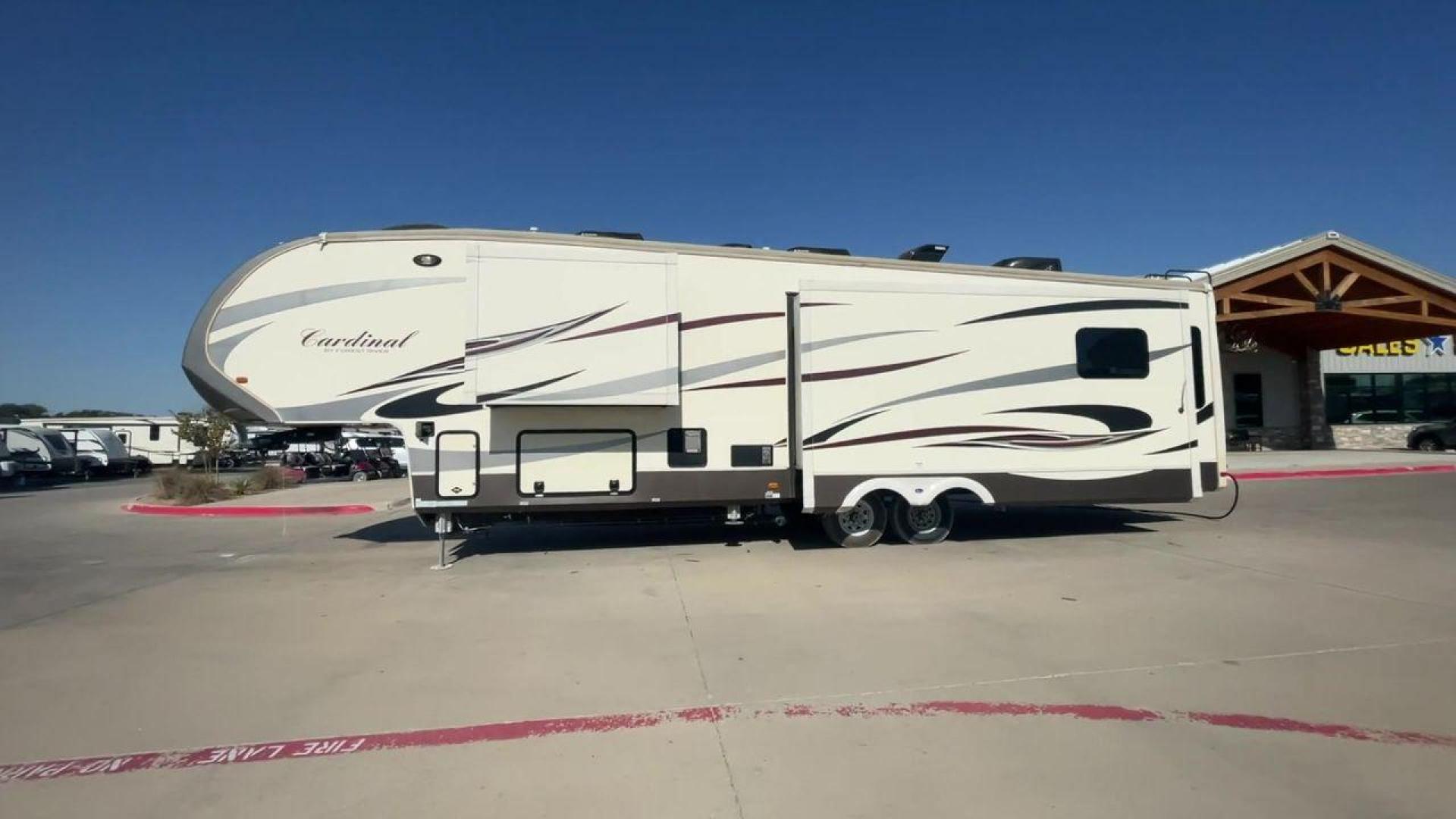 2016 BEIGE FOREST RIVER CARDINAL 3875FB - (4X4FCAR23GG) , Length: 40.5 ft. | Dry Weight: 14,034 lbs. | Gross Weight: 16,170 lbs. | Slides: 3 transmission, located at 4319 N Main St, Cleburne, TX, 76033, (817) 678-5133, 32.385960, -97.391212 - The elegant and well-equipped 2016 Forest River Cardinal 3875FB travel trailer will elevate your camping experience. Designed with care, this fifth wheel provides you with comfort, utility, and style for your road trips. This fifth wheel have dimensions of 40.5 ft in length, 8.33 ft in width, and 13 - Photo#6