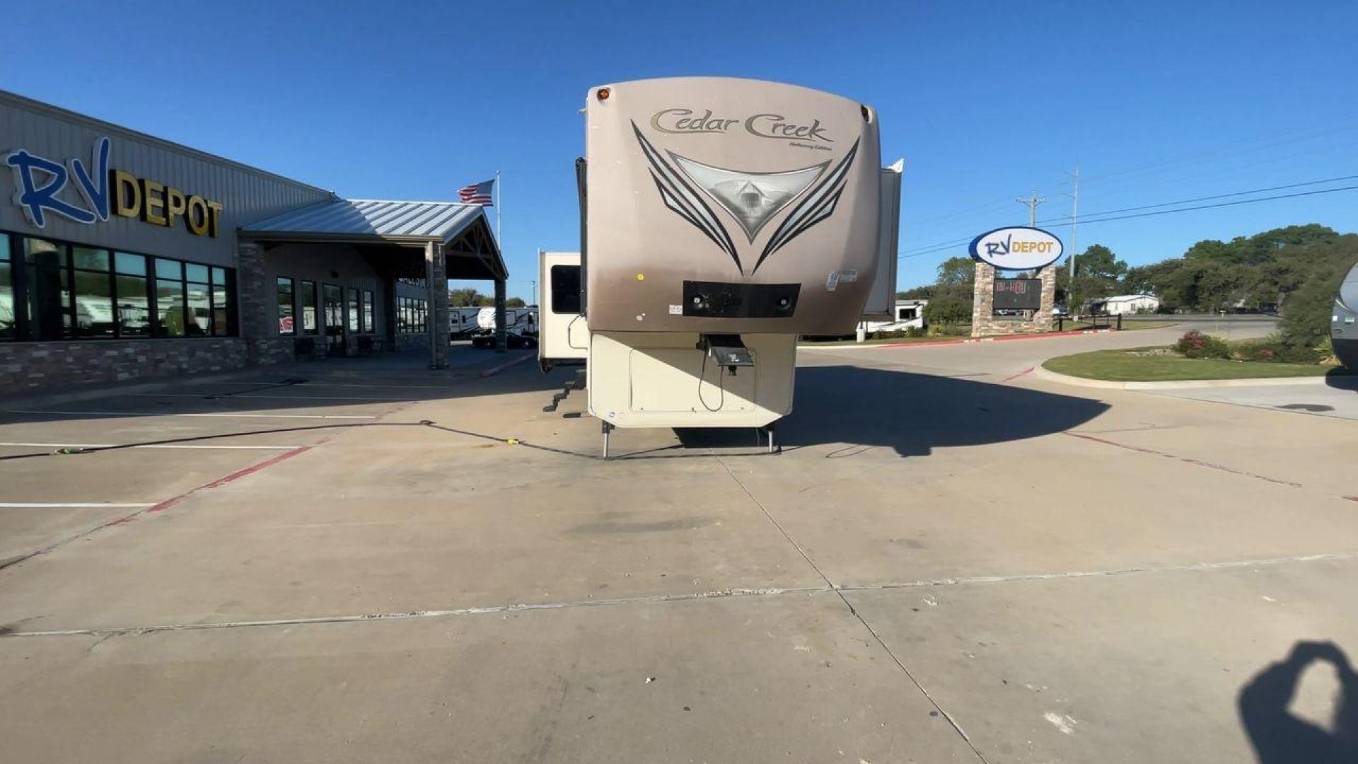 2016 FOREST RIVER CEDAR CREEK 36CKTS - (4X4FCRM24GS) , Length: 39.83 ft. | Dry Weight: 12,670 lbs. | Gross Weight: 16,407 lbs. | Slides: 3 transmission, located at 4319 N Main St, Cleburne, TX, 76033, (817) 678-5133, 32.385960, -97.391212 - Photo#4