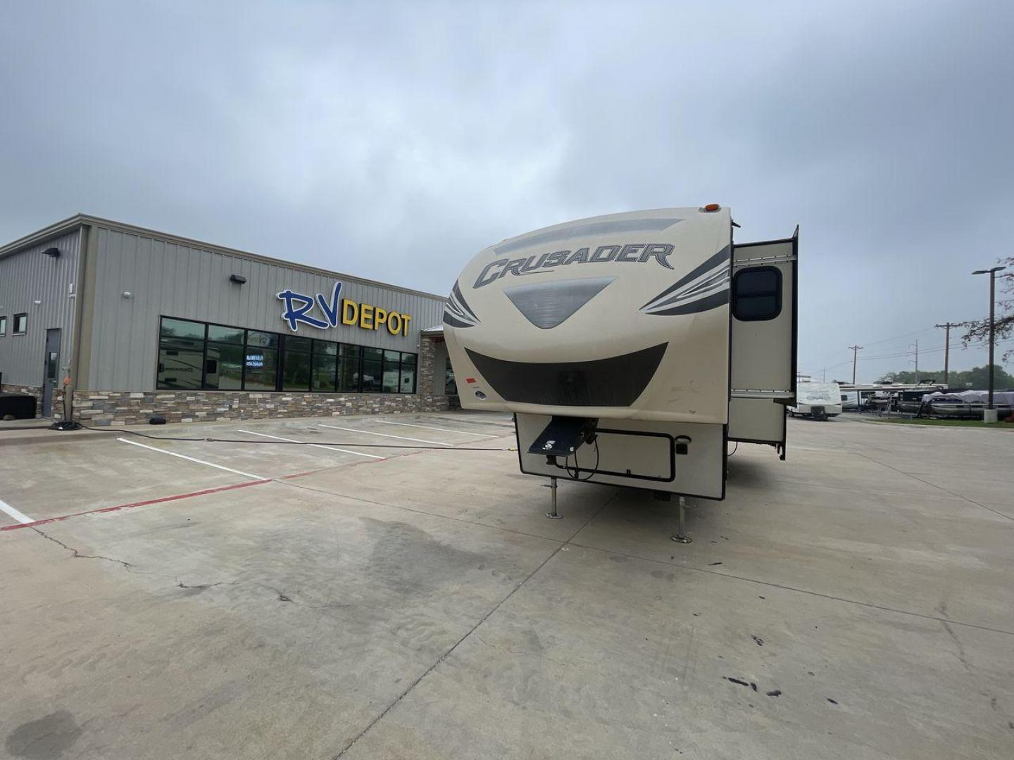 2016 TAN FOREST RIVER CRUSADER 315 (5ZT3CSXB8GG) , Length: 33.92 ft. | Dry Weight: 9,926 lbs. | Gross Weight: 12,353 lbs. | Slides: 3 transmission, located at 4319 N Main St, Cleburne, TX, 76033, (817) 678-5133, 32.385960, -97.391212 - Photo#0