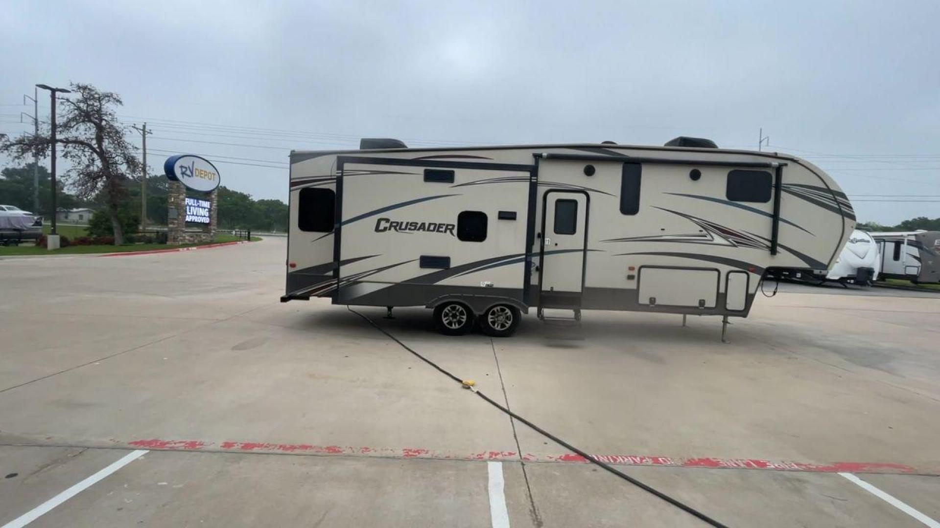 2016 TAN FOREST RIVER CRUSADER 315 (5ZT3CSXB8GG) , Length: 33.92 ft. | Dry Weight: 9,926 lbs. | Gross Weight: 12,353 lbs. | Slides: 3 transmission, located at 4319 N Main St, Cleburne, TX, 76033, (817) 678-5133, 32.385960, -97.391212 - Photo#2