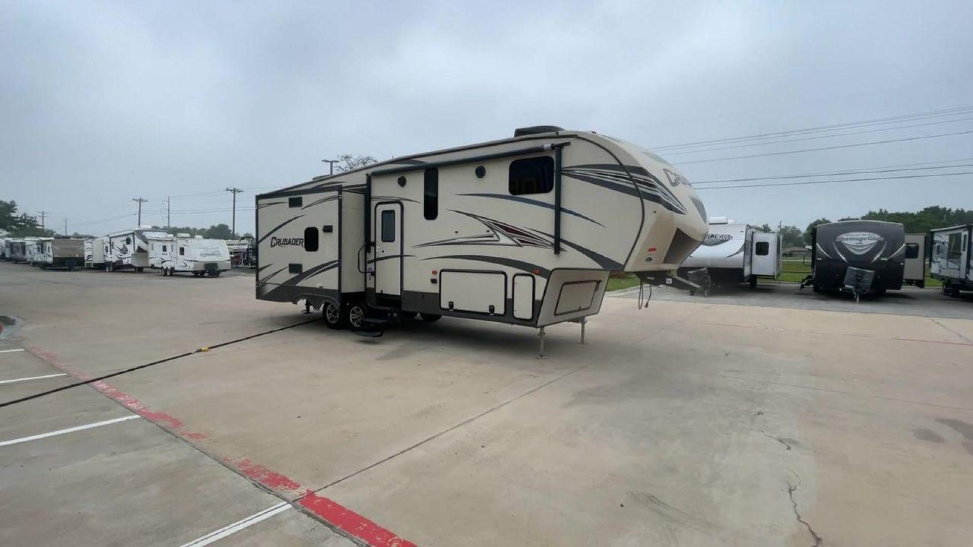 2016 TAN FOREST RIVER CRUSADER 315 (5ZT3CSXB8GG) , Length: 33.92 ft. | Dry Weight: 9,926 lbs. | Gross Weight: 12,353 lbs. | Slides: 3 transmission, located at 4319 N Main St, Cleburne, TX, 76033, (817) 678-5133, 32.385960, -97.391212 - Photo#3