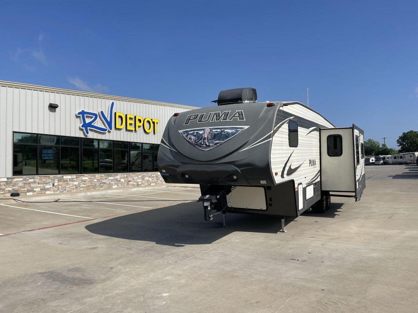 2016 FOREST RIVER PUMA 297RLSS (4X4FPUF29GP) , located at 4319 N Main St, Cleburne, TX, 76033, (817) 678-5133, 32.385960, -97.391212 - Photo#0