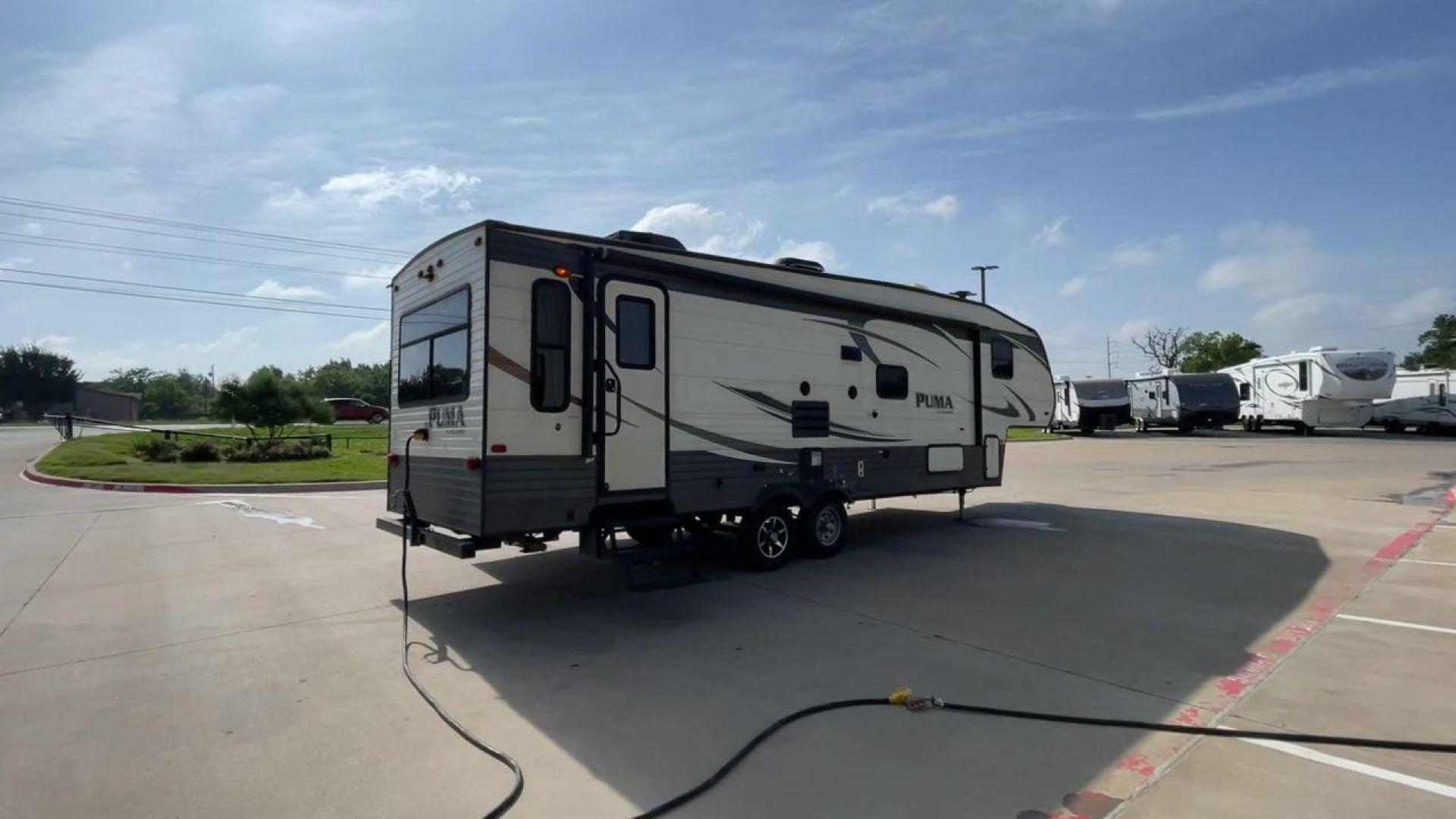 2016 FOREST RIVER PUMA 297RLSS (4X4FPUF29GP) , located at 4319 N Main St, Cleburne, TX, 76033, (817) 678-5133, 32.385960, -97.391212 - Photo#1