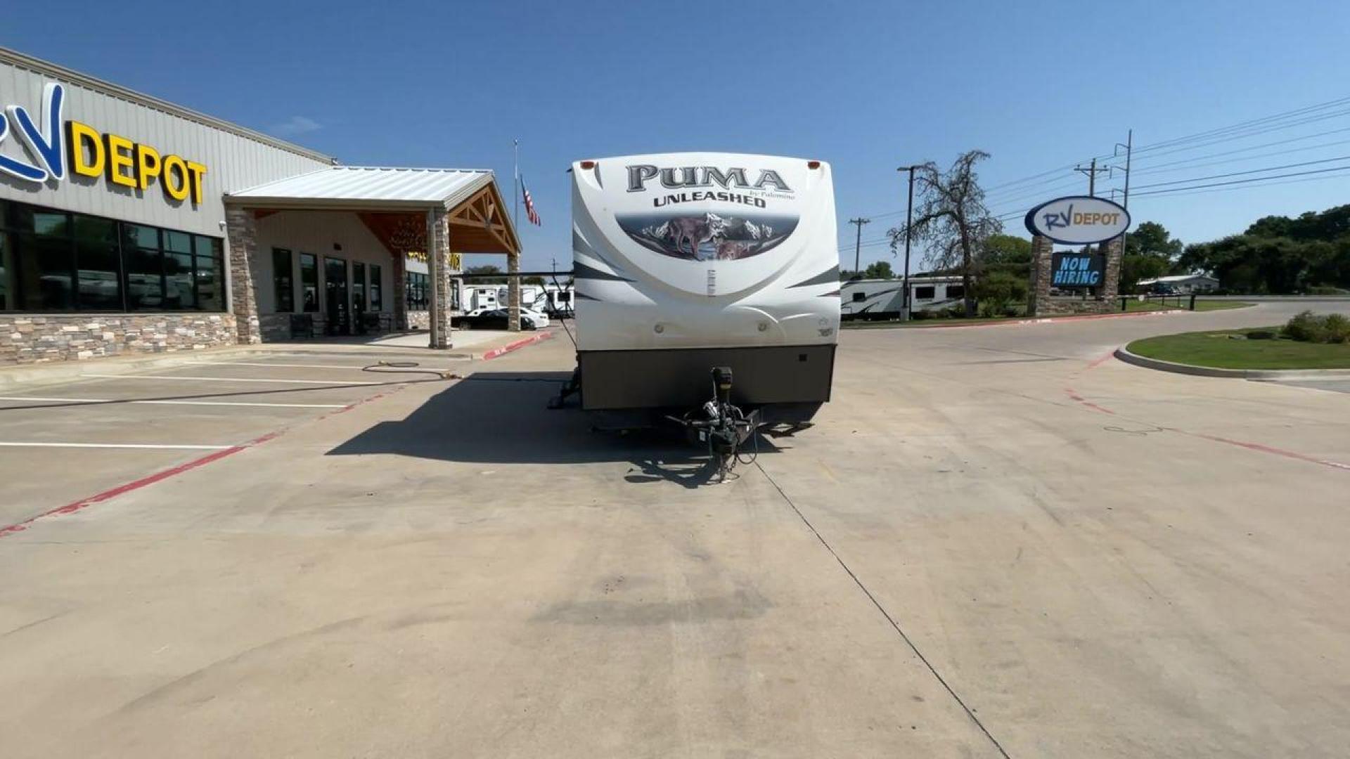 2016 FOREST RIVER PUMA UNLEASHED 25TFS (4X4TPTA27GP) , Length: 29.67 ft. | Dry Weight: 6,991 lbs. | Gross Weight: 9,939 lbs. | Slides: 0 transmission, located at 4319 N Main St, Cleburne, TX, 76033, (817) 678-5133, 32.385960, -97.391212 - This 2016 Forest River Puma Unleashed 25TFS measures just under 30 feet long. It has a dry weight of 6,991 lbs. and a GVWR of 9,939 lbs. It comes equipped with automatic heating and cooling rated at 30,000 and 13,500 BTUs respectively. It is also designed with a 14-foot power awning. This toy hau - Photo#4