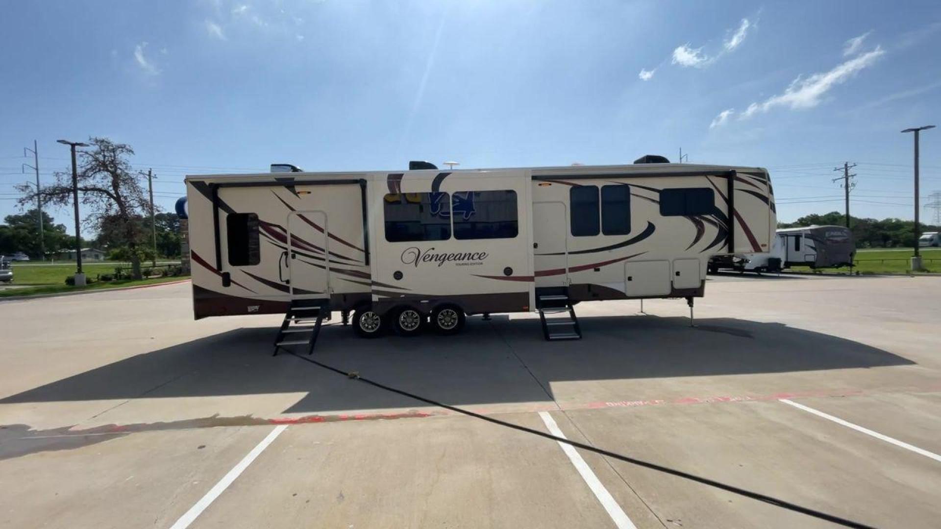 2016 FOREST RIVER VENGEANCE 38L12 (4X4FVGP36GR) , Length: 42.83 ft | Dry Weight: 14,814 lbs | Gross Weight: 18,000 lbs | Slides: 3 transmission, located at 4319 N Main St, Cleburne, TX, 76033, (817) 678-5133, 32.385960, -97.391212 - The 2016 Forest River Vengeance 38L12 is a luxury fifth-wheel toy hauler that provides a spacious and comfortable living area for all of your activities. With a length of roughly 42.83 feet and a dry weight of 14,814 pounds, this RV offers enough space and durability to meet your demands. With an al - Photo#2