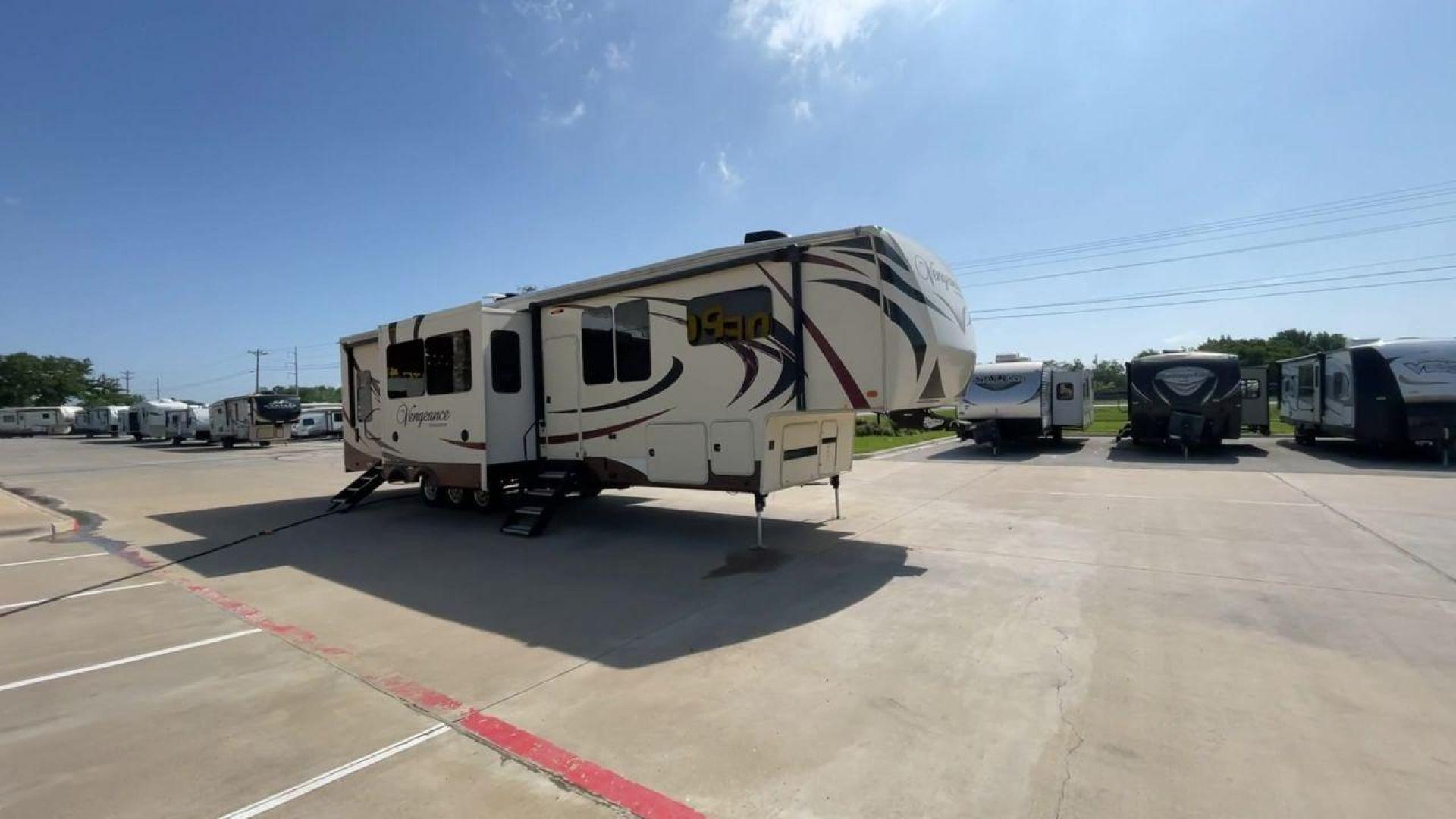 2016 FOREST RIVER VENGEANCE 38L12 (4X4FVGP36GR) , Length: 42.83 ft | Dry Weight: 14,814 lbs | Gross Weight: 18,000 lbs | Slides: 3 transmission, located at 4319 N Main St, Cleburne, TX, 76033, (817) 678-5133, 32.385960, -97.391212 - The 2016 Forest River Vengeance 38L12 is a luxury fifth-wheel toy hauler that provides a spacious and comfortable living area for all of your activities. With a length of roughly 42.83 feet and a dry weight of 14,814 pounds, this RV offers enough space and durability to meet your demands. With an al - Photo#3