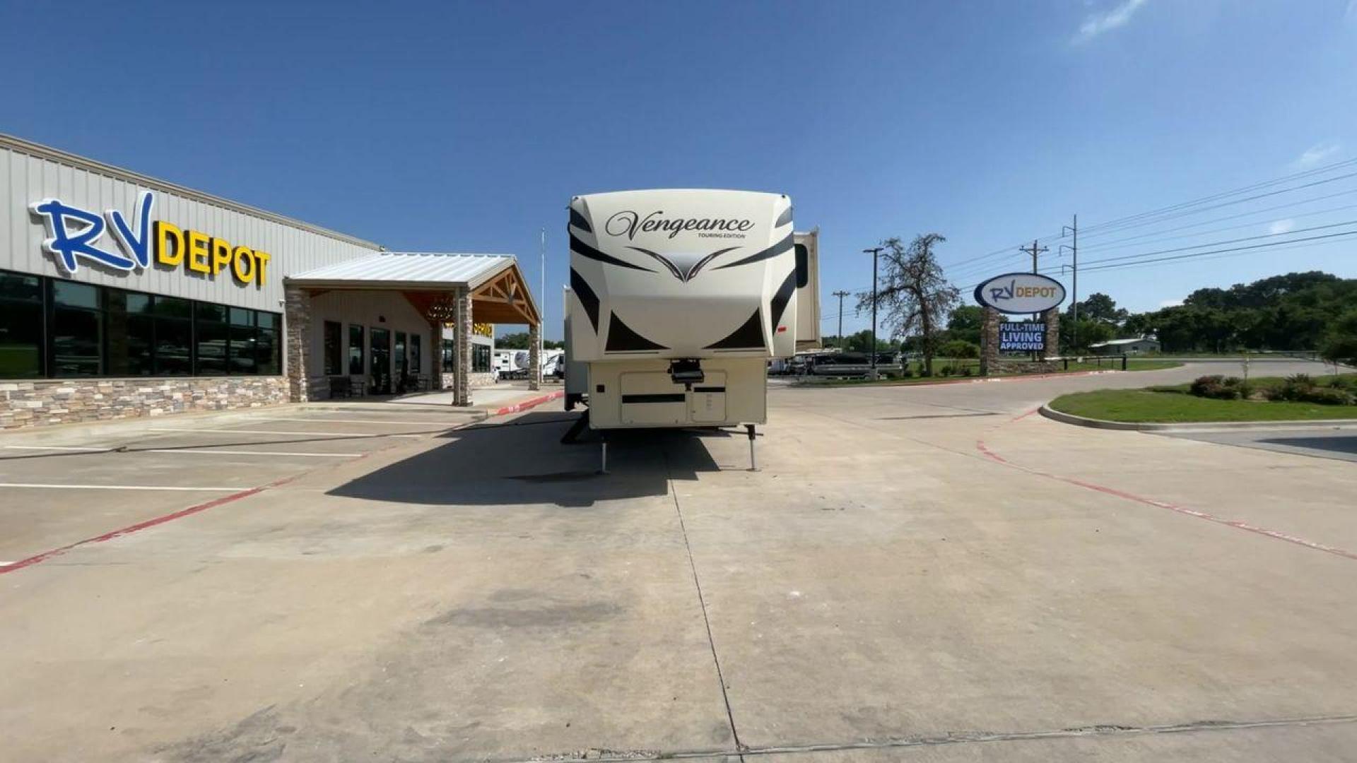 2016 FOREST RIVER VENGEANCE 38L12 (4X4FVGP36GR) , Length: 42.83 ft | Dry Weight: 14,814 lbs | Gross Weight: 18,000 lbs | Slides: 3 transmission, located at 4319 N Main St, Cleburne, TX, 76033, (817) 678-5133, 32.385960, -97.391212 - The 2016 Forest River Vengeance 38L12 is a luxury fifth-wheel toy hauler that provides a spacious and comfortable living area for all of your activities. With a length of roughly 42.83 feet and a dry weight of 14,814 pounds, this RV offers enough space and durability to meet your demands. With an al - Photo#4