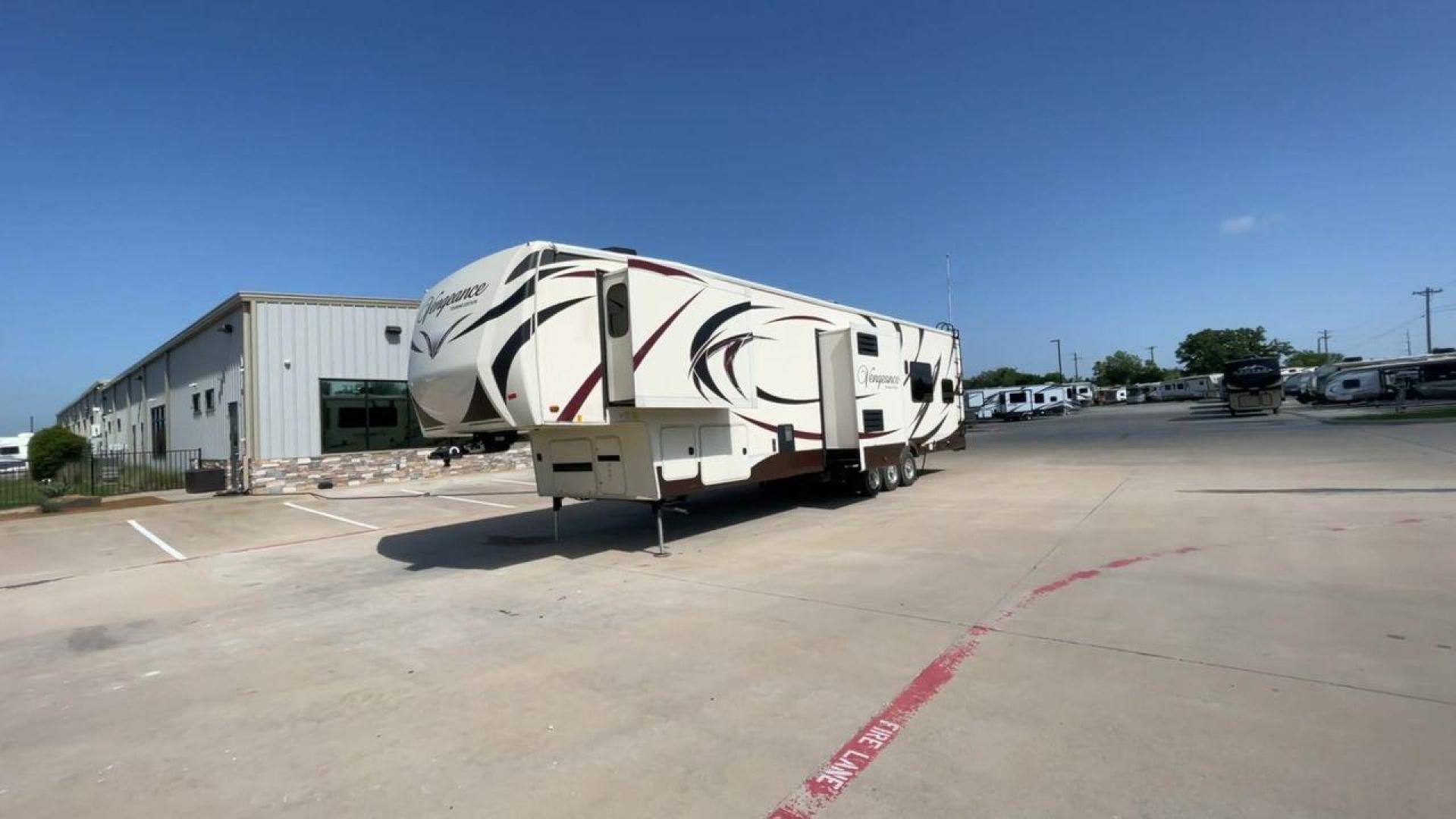 2016 FOREST RIVER VENGEANCE 38L12 (4X4FVGP36GR) , Length: 42.83 ft | Dry Weight: 14,814 lbs | Gross Weight: 18,000 lbs | Slides: 3 transmission, located at 4319 N Main St, Cleburne, TX, 76033, (817) 678-5133, 32.385960, -97.391212 - The 2016 Forest River Vengeance 38L12 is a luxury fifth-wheel toy hauler that provides a spacious and comfortable living area for all of your activities. With a length of roughly 42.83 feet and a dry weight of 14,814 pounds, this RV offers enough space and durability to meet your demands. With an al - Photo#5