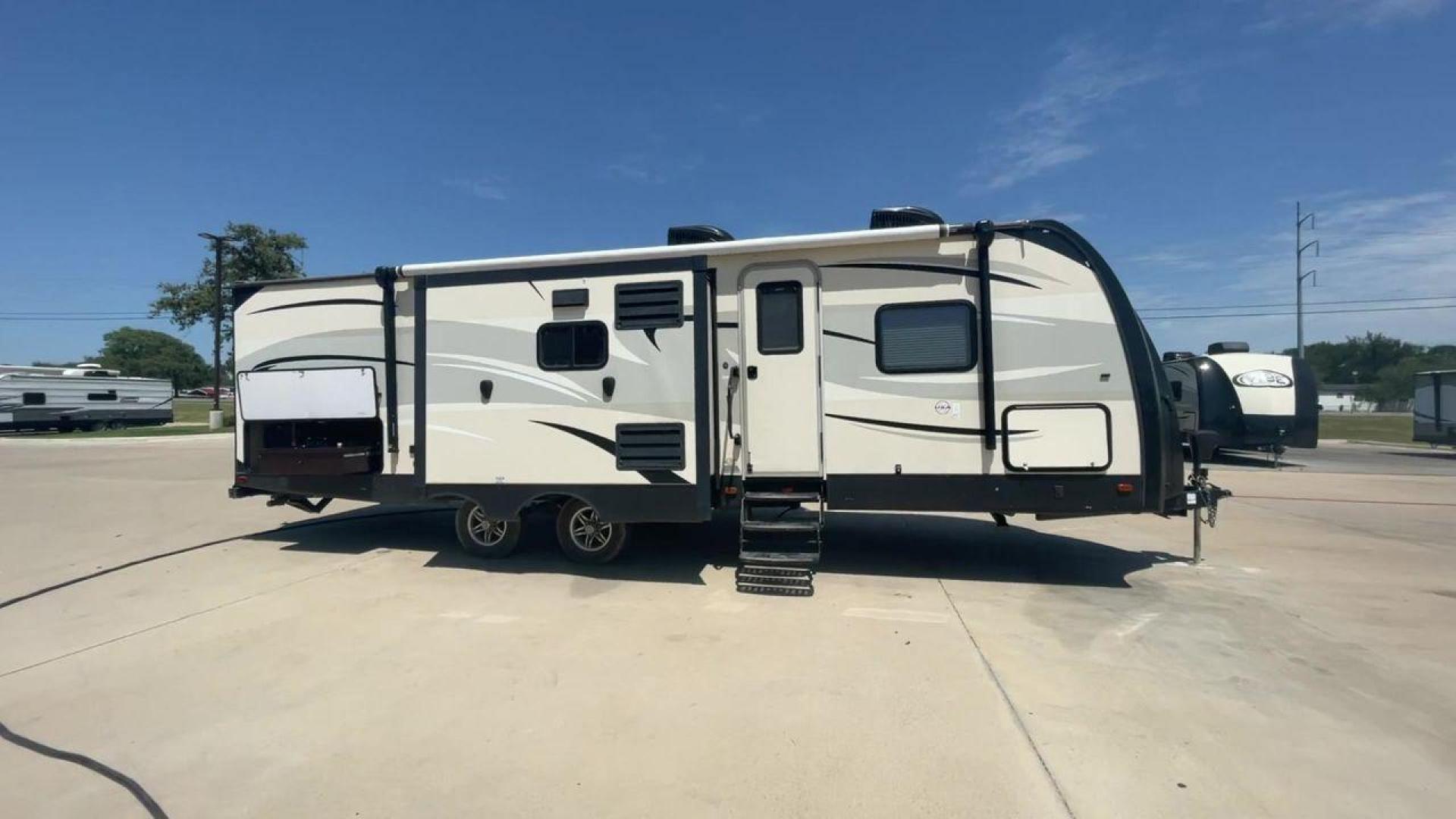 2016 WHITE FOREST RIVER VIBE 279RBS (4X4TVBD26G4) , Length: 33.25 ft. | Dry Weight: 7,032 lbs. | Slides: 2 transmission, located at 4319 N Main St, Cleburne, TX, 76033, (817) 678-5133, 32.385960, -97.391212 - Photo#2