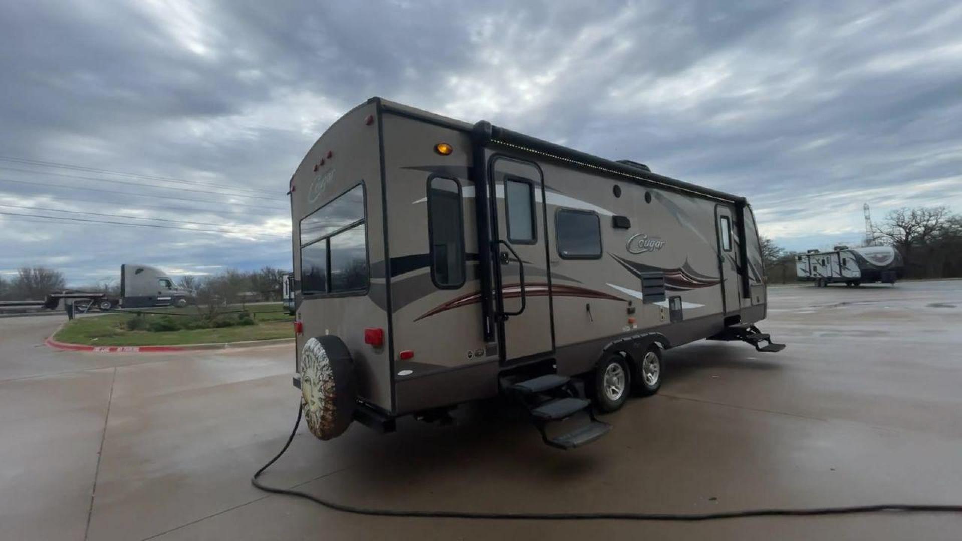 2016 KEYSTONE COUGAR 28RLS (4YDT28R21GV) , located at 4319 N Main St, Cleburne, TX, 76033, (817) 678-5133, 32.385960, -97.391212 - Photo#1