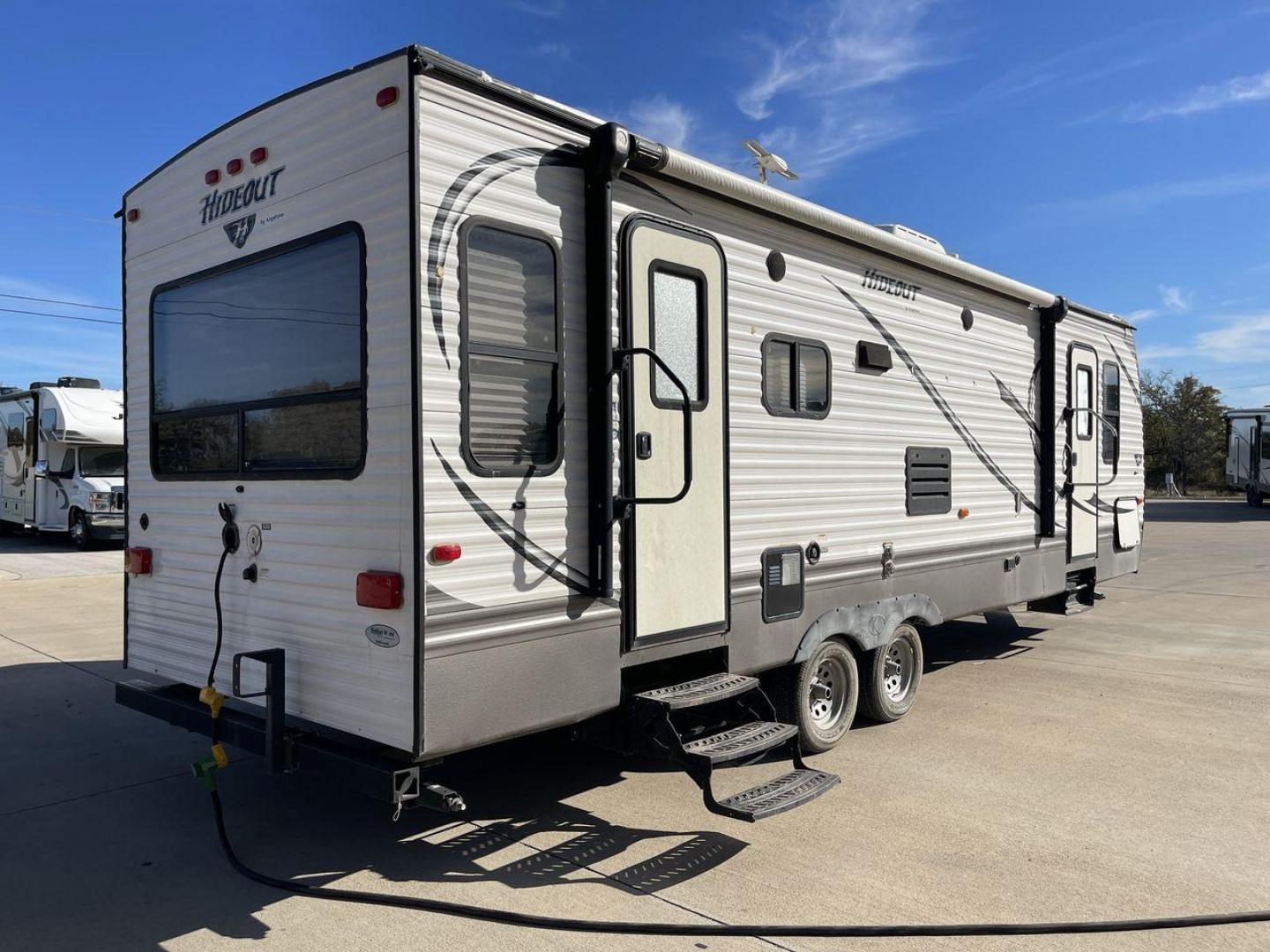 2016 KEYSTONE HIDEOUT (4YDT26R2XG7) , Length: 29.92 ft | Dry Weight: 6,334 lbs | Gross Weight: 7,835 lbs | Slides: 1 transmission, located at 4319 N Main St, Cleburne, TX, 76033, (817) 678-5133, 32.385960, -97.391212 - The Hideout 26RLS by 26RLS travel trailer is a small, half-ton towable, inexpensive camper. It is 29.92 ft in length, 8 ft in width, and 11 ft in height. The dry weight is 6,334 lbs with a payload capacity of 1,501 lbs. The trailer has a GVWR of 7,835 lbs and a hitch weight of 835 lbs. It features l - Photo#25