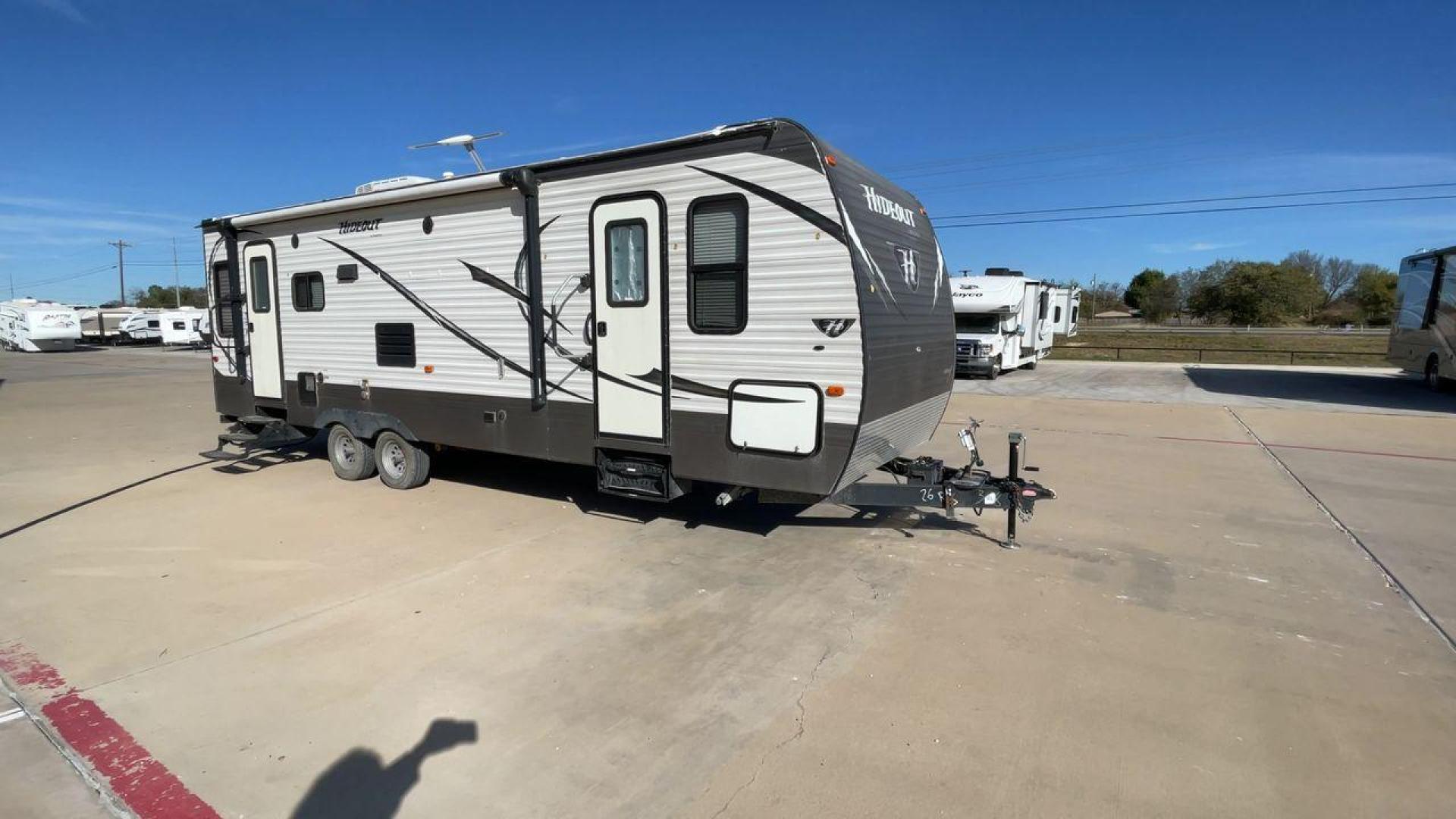 2016 KEYSTONE HIDEOUT (4YDT26R2XG7) , Length: 29.92 ft | Dry Weight: 6,334 lbs | Gross Weight: 7,835 lbs | Slides: 1 transmission, located at 4319 N Main St, Cleburne, TX, 76033, (817) 678-5133, 32.385960, -97.391212 - The Hideout 26RLS by 26RLS travel trailer is a small, half-ton towable, inexpensive camper. It is 29.92 ft in length, 8 ft in width, and 11 ft in height. The dry weight is 6,334 lbs with a payload capacity of 1,501 lbs. The trailer has a GVWR of 7,835 lbs and a hitch weight of 835 lbs. It features l - Photo#3