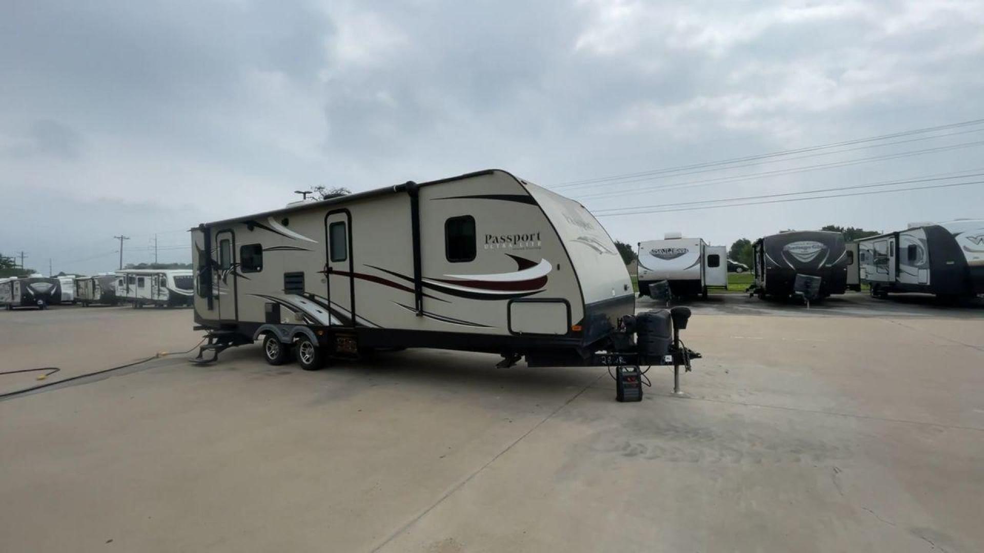 2016 KEYSTONE PASSPORT 2890RL (4YDT28924GT) , Length: 33.25 ft. | Dry Weight: 5,500 lbs. | Gross Weight: 7,200 lbs. | Slides: 1 transmission, located at 4319 N Main St, Cleburne, TX, 76033, (817) 678-5133, 32.385960, -97.391212 - Photo#3