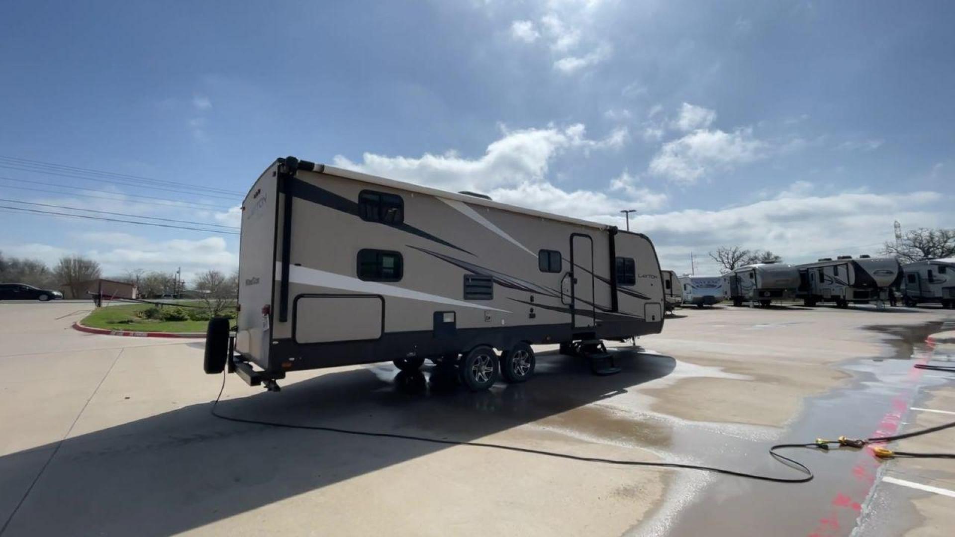 2016 GRAY LAYTON 285BH - (5ZWTYNS23G4) , Length: 33 ft. | Dry Weight: 6,125 lbs. | Gross Weight: 11,200 lbs. | Slides: 1 transmission, located at 4319 N Main St, Cleburne, TX, 76033, (817) 678-5133, 32.385960, -97.391212 - Camp in the 2016 Layton 285BH and enjoy all of its amazing amenities!It measures 33 ft. in length and 11.5 ft. in height. It has a dry weight of 6,125 lbs. and a payload capacity of 3,223 lbs. It is made of aluminum and fiberglass. It also comes equipped with automatic heating and cooling rated at 2 - Photo#1