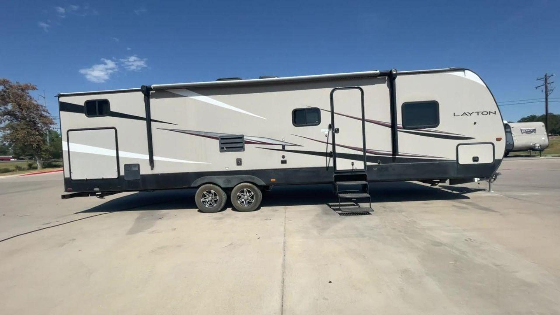 2016 TAN LAYTON 305BH - (5ZWTYTS21G4) , Length: 36.5 ft. | Dry Weight: 6,885 lbs. | Gross Weight: 11,200 lbs. | Slides: 2 transmission, located at 4319 N Main St, Cleburne, TX, 76033, (817) 678-5133, 32.385960, -97.391212 - Go on your next trip with the 2016 Layton 305BH, a travel trailer that is roomy and well-equipped for comfort and ease of use. This RV provides ample space for the entire family to enjoy, measuring 36.5 feet in length and weighing 6,885 pounds when dry and 11,200 pounds when fully loaded. With two s - Photo#2