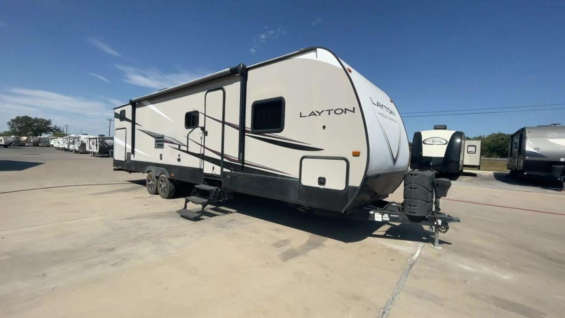 2016 TAN LAYTON 305BH - (5ZWTYTS21G4) , Length: 36.5 ft. | Dry Weight: 6,885 lbs. | Gross Weight: 11,200 lbs. | Slides: 2 transmission, located at 4319 N Main St, Cleburne, TX, 76033, (817) 678-5133, 32.385960, -97.391212 - Go on your next trip with the 2016 Layton 305BH, a travel trailer that is roomy and well-equipped for comfort and ease of use. This RV provides ample space for the entire family to enjoy, measuring 36.5 feet in length and weighing 6,885 pounds when dry and 11,200 pounds when fully loaded. With two s - Photo#3