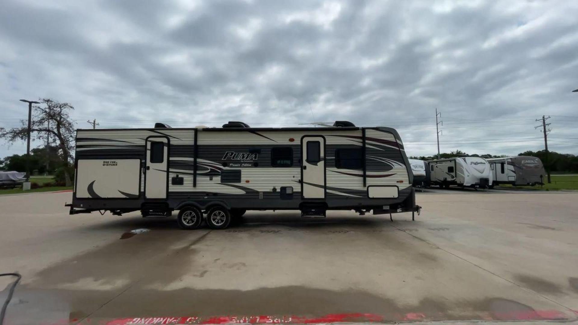 2016 PALOMINO PUMA 31BHSS (4X4TPUG27GP) , Length: 35.33 ft. | Dry Weight: 7,958 lbs. | Gross Weight: 9,600 lbs. | Slides: 2 transmission, located at 4319 N Main St, Cleburne, TX, 76033, (817) 678-5133, 32.385960, -97.391212 - Photo#2