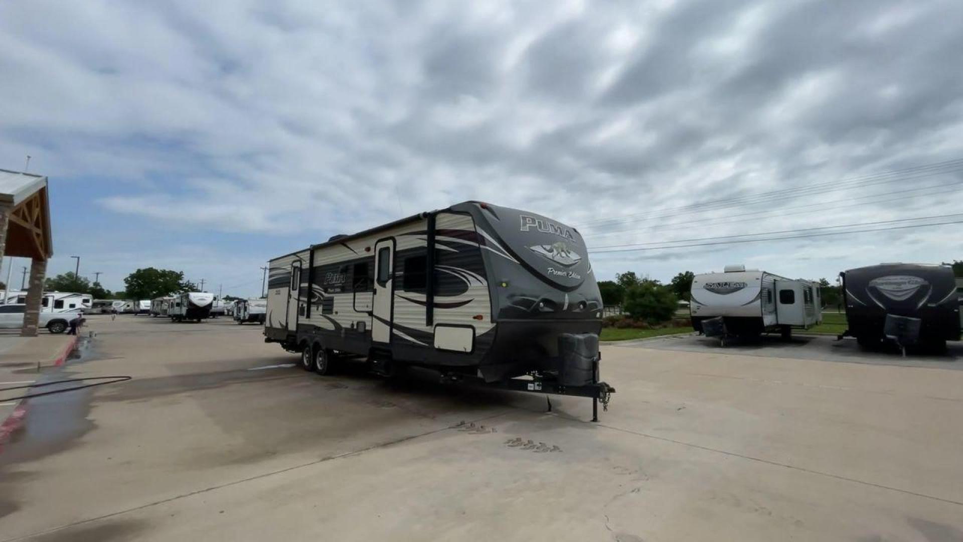 2016 PALOMINO PUMA 31BHSS (4X4TPUG27GP) , Length: 35.33 ft. | Dry Weight: 7,958 lbs. | Gross Weight: 9,600 lbs. | Slides: 2 transmission, located at 4319 N Main St, Cleburne, TX, 76033, (817) 678-5133, 32.385960, -97.391212 - Photo#3