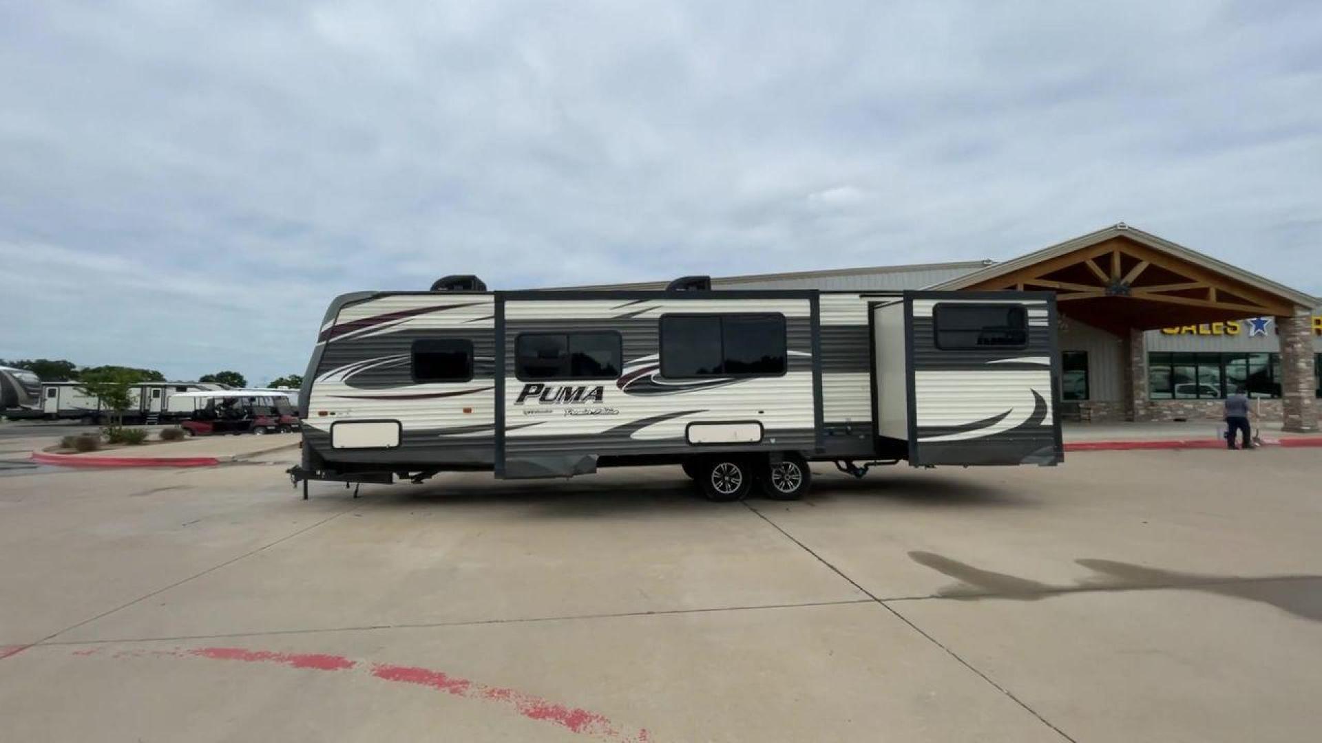 2016 PALOMINO PUMA 31BHSS (4X4TPUG27GP) , Length: 35.33 ft. | Dry Weight: 7,958 lbs. | Gross Weight: 9,600 lbs. | Slides: 2 transmission, located at 4319 N Main St, Cleburne, TX, 76033, (817) 678-5133, 32.385960, -97.391212 - Photo#6