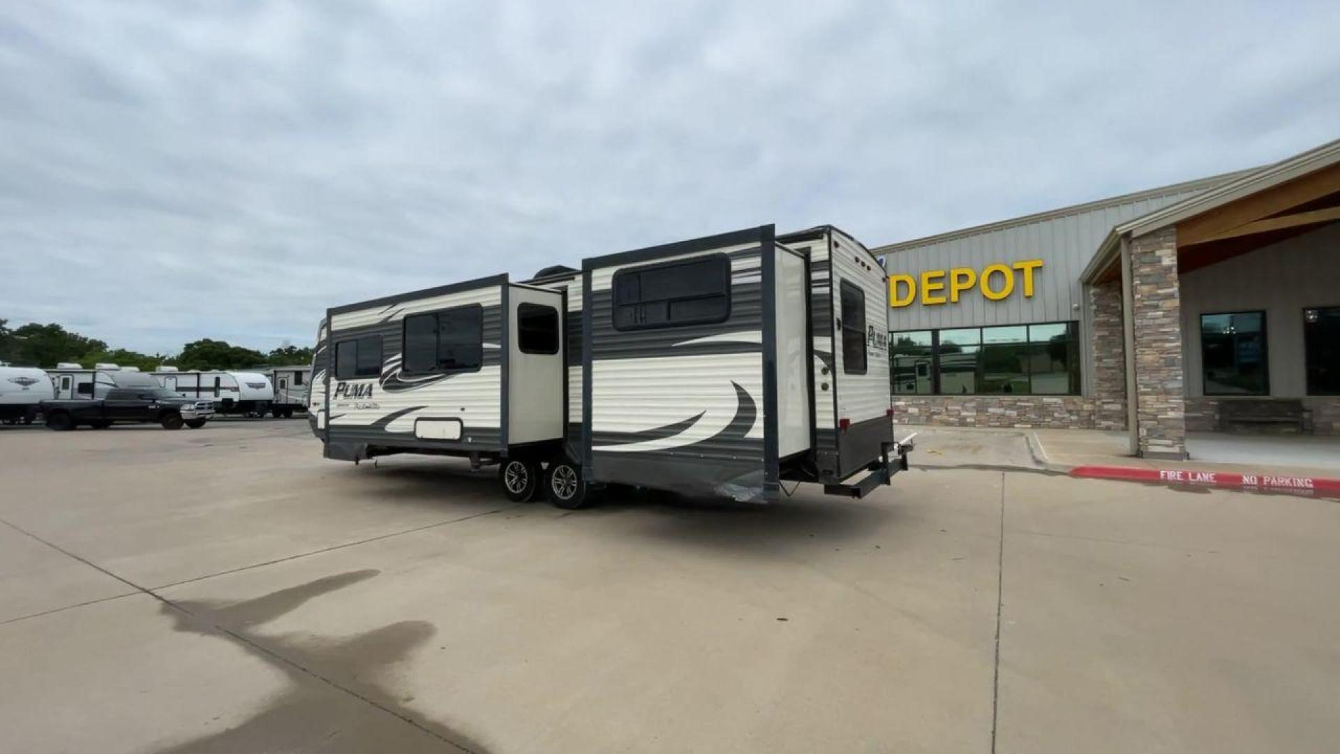 2016 PALOMINO PUMA 31BHSS (4X4TPUG27GP) , Length: 35.33 ft. | Dry Weight: 7,958 lbs. | Gross Weight: 9,600 lbs. | Slides: 2 transmission, located at 4319 N Main St, Cleburne, TX, 76033, (817) 678-5133, 32.385960, -97.391212 - Photo#7