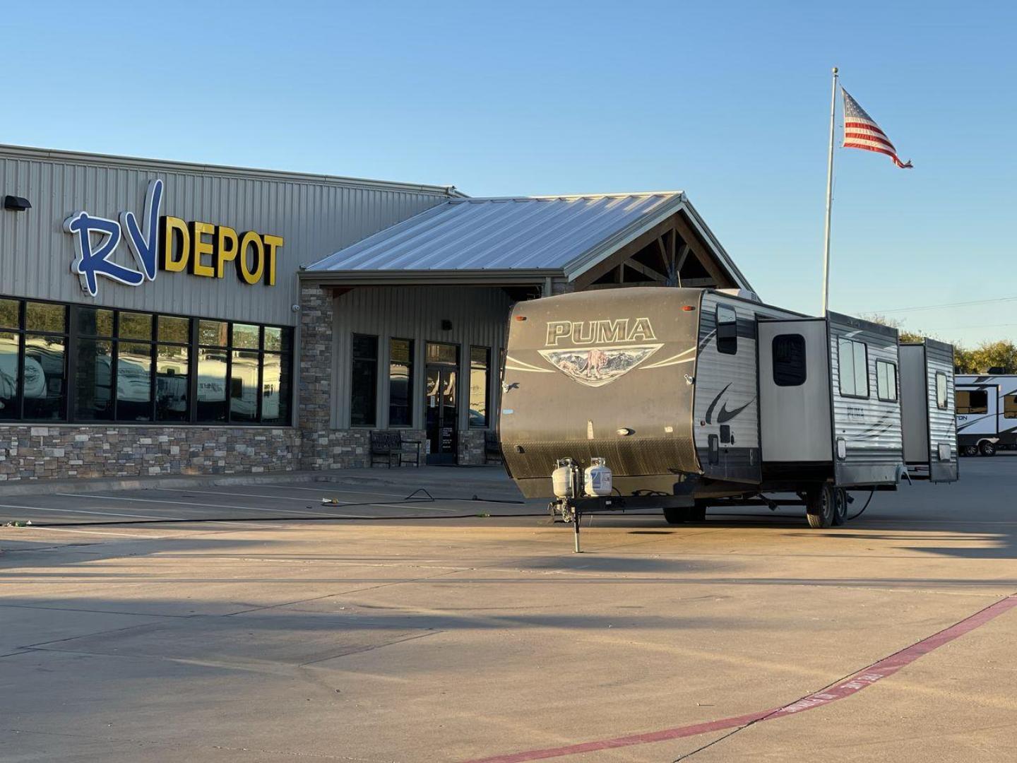 2016 TAN PUMA 32FBIS (4X4TPUH21GP) , Length: 35.33 ft. | Dry Weight: 8,858 lbs. | Gross Weight: 10,500 lbs. | Slides: 3 transmission, located at 4319 N Main St, Cleburne, TX, 76033, (817) 678-5133, 32.385960, -97.391212 - Photo#0